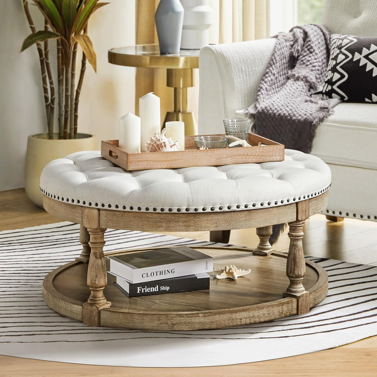 Detail crop from a slightly higher angle highlighting nailhead trim, turned wooden leg and the round lower wood shelf on a