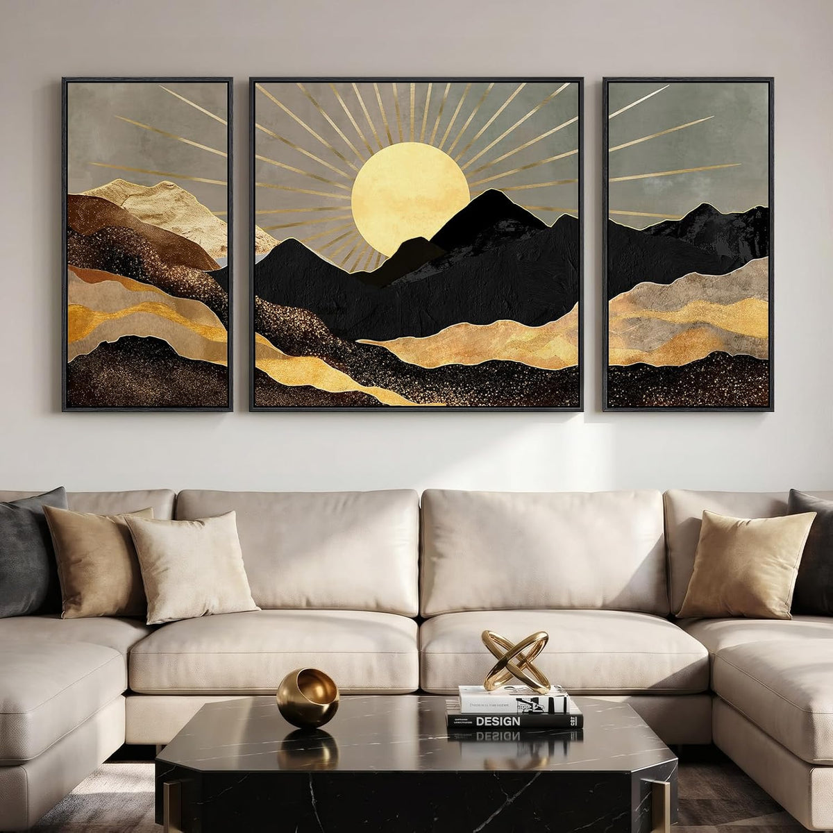 Three-panel landscape with a gold sun and layered black and gold mountains above a cream couch.