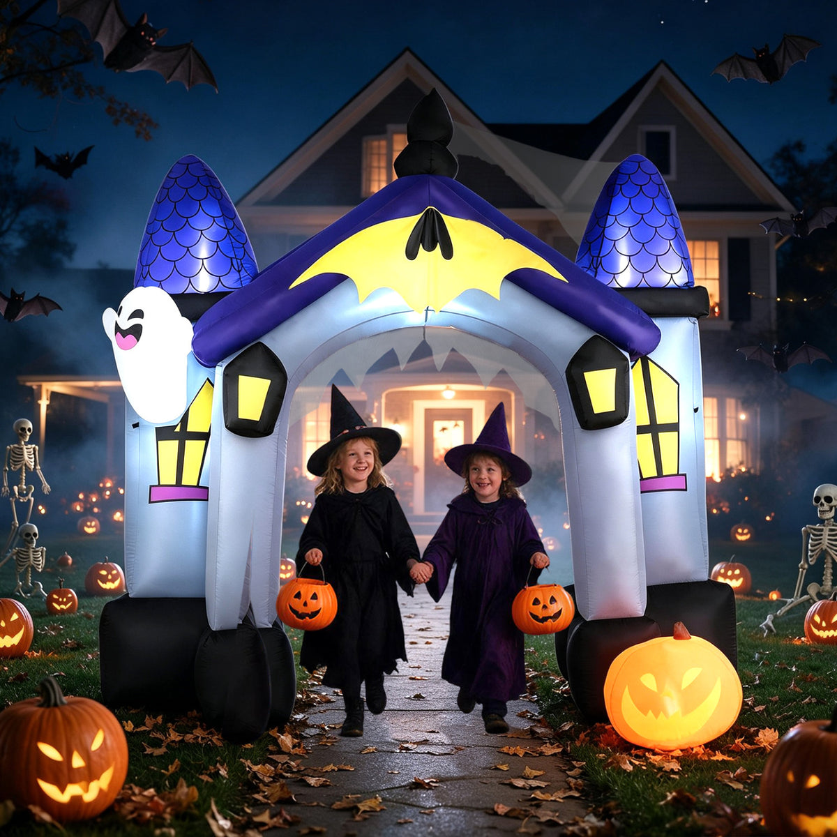 A lit Halloween archway frames two children in costumes, with bats, skeletons and glowing pumpkins around them.