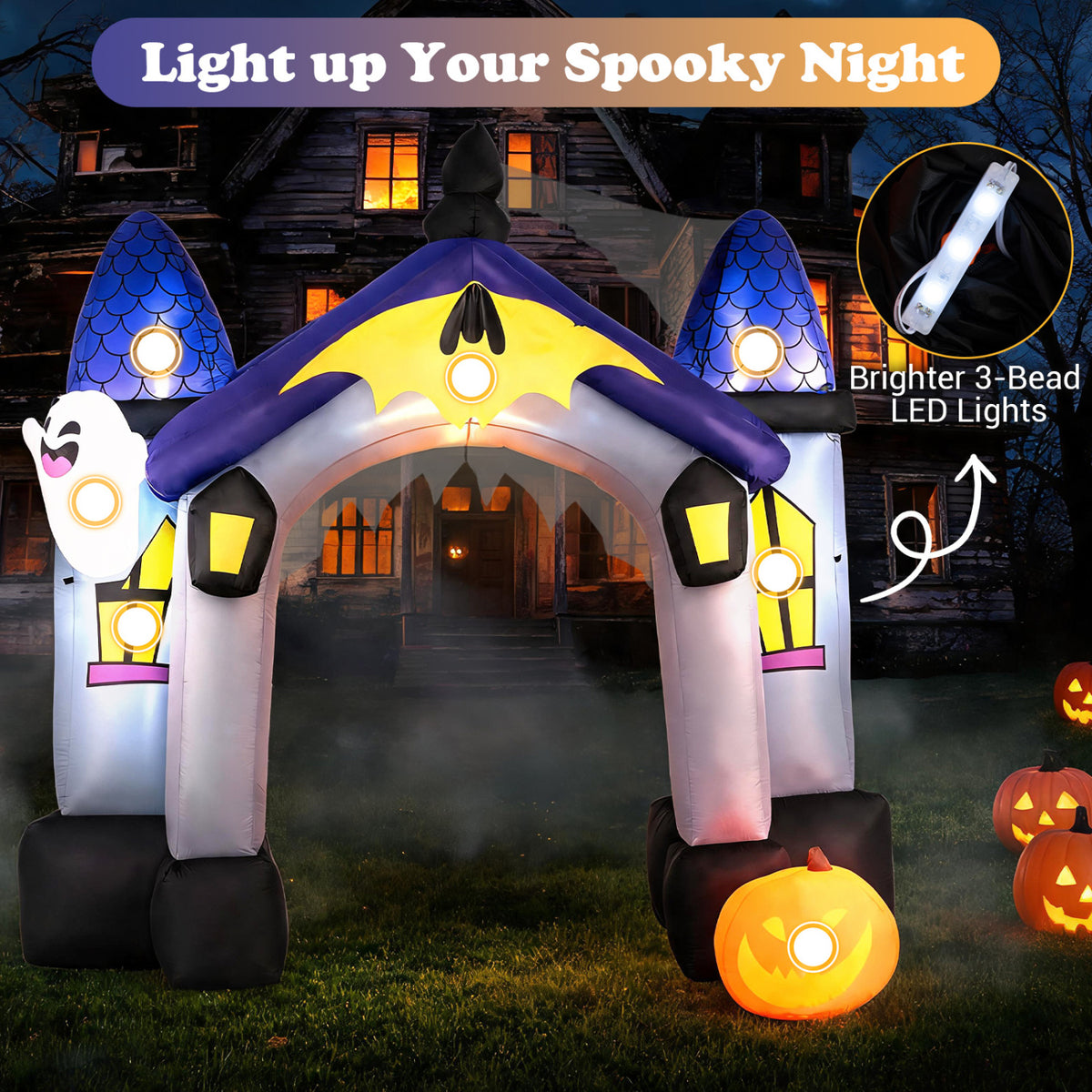 Illuminated Halloween castle archway with blue towers, a ghost, and a glowing pumpkin in front of a dark house.