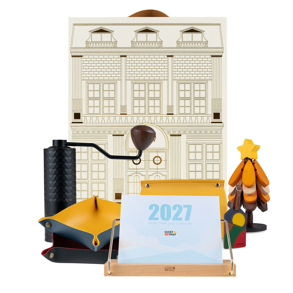 Gift set arranged in front of an illustrated box, with a desk calendar, hand grinder, trays, tag and tree ornament.
