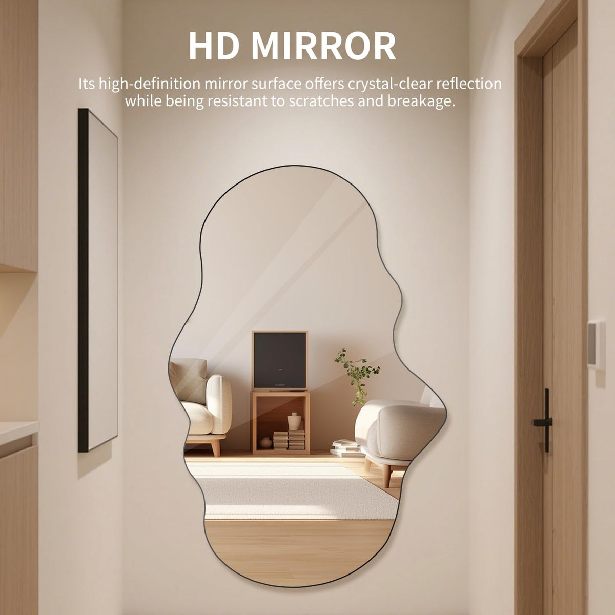 Irregular frameless mirror in a narrow hallway reflecting a bright living room with beige seating and natural light