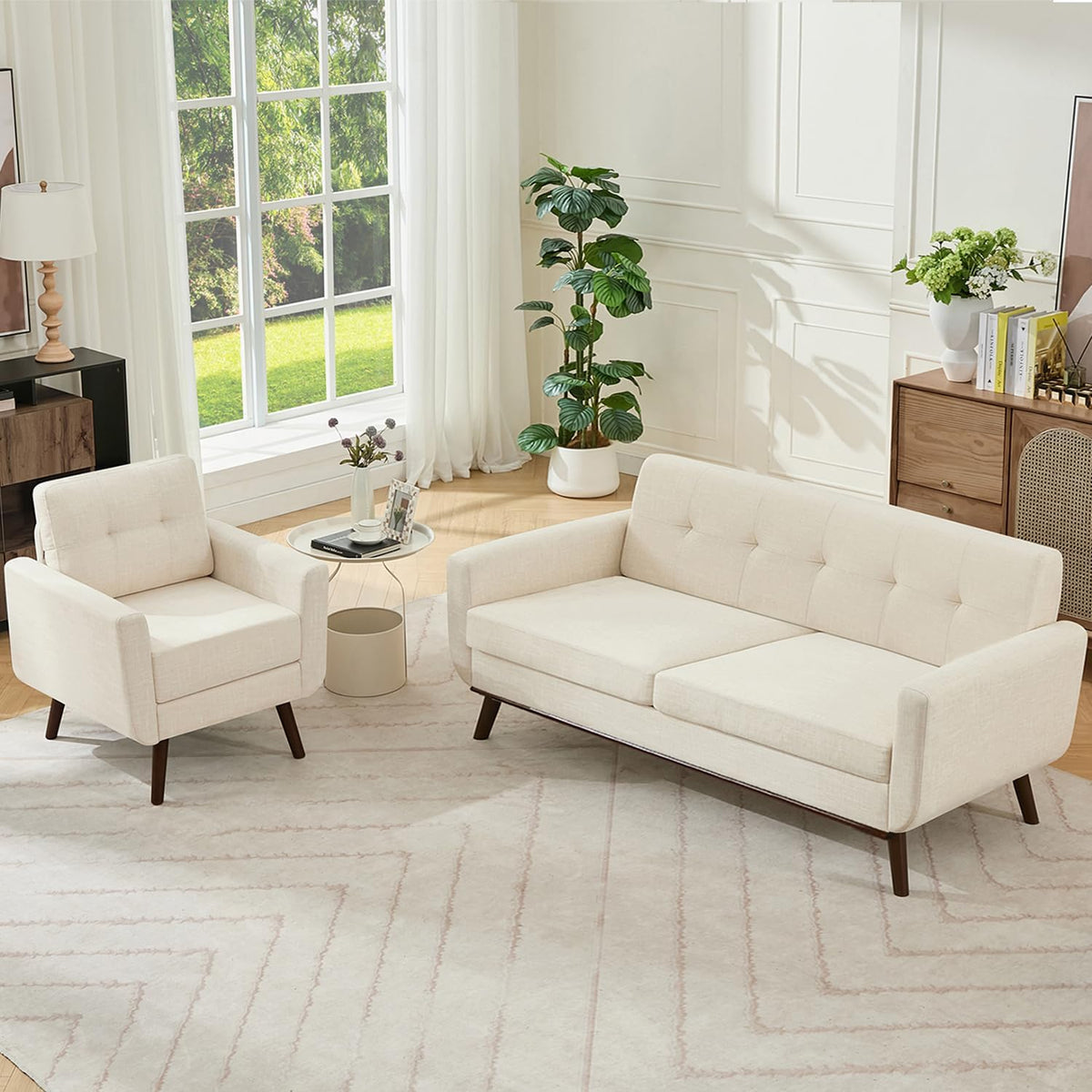 Light beige tufted loveseat paired with matching armchair beside a tall window