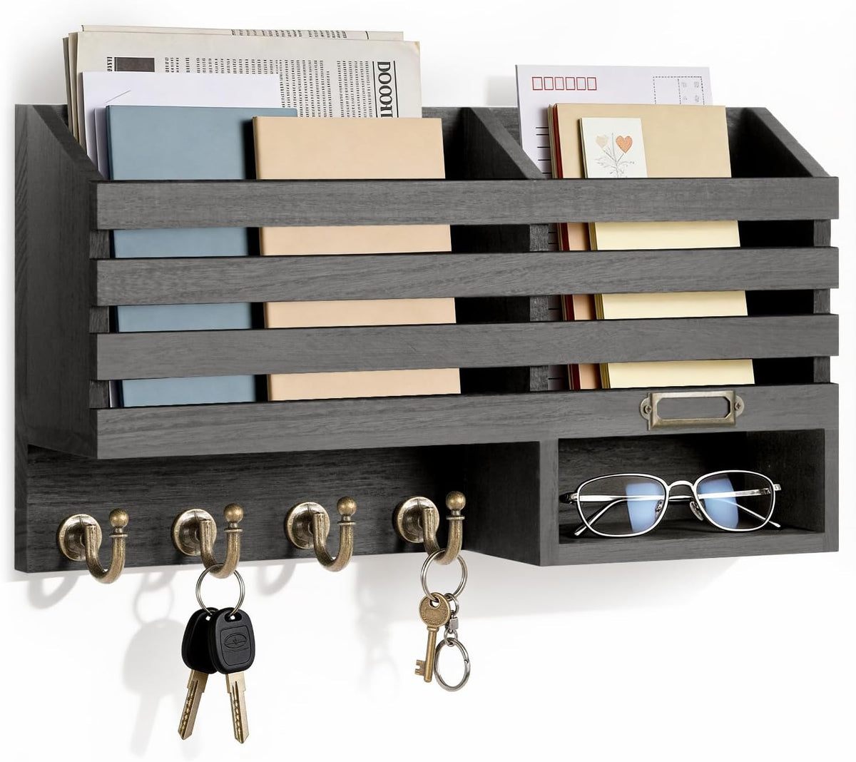Dark organizer showing two vertical mail slots, metal label frame and a lower open cubby holding eyeglasses