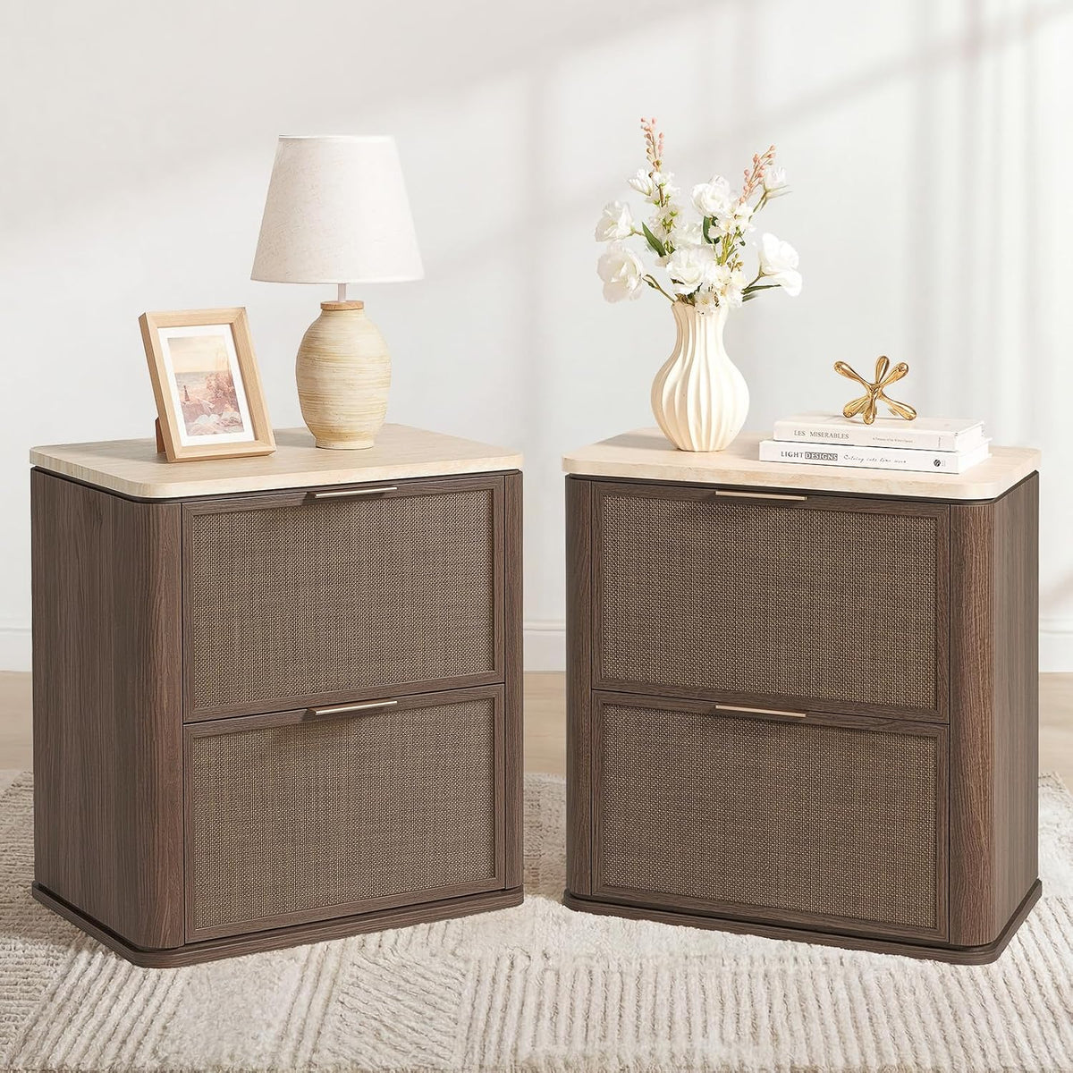 Two dark wood nightstands with light faux-marble tops styled with a lamp and vase on a rug.