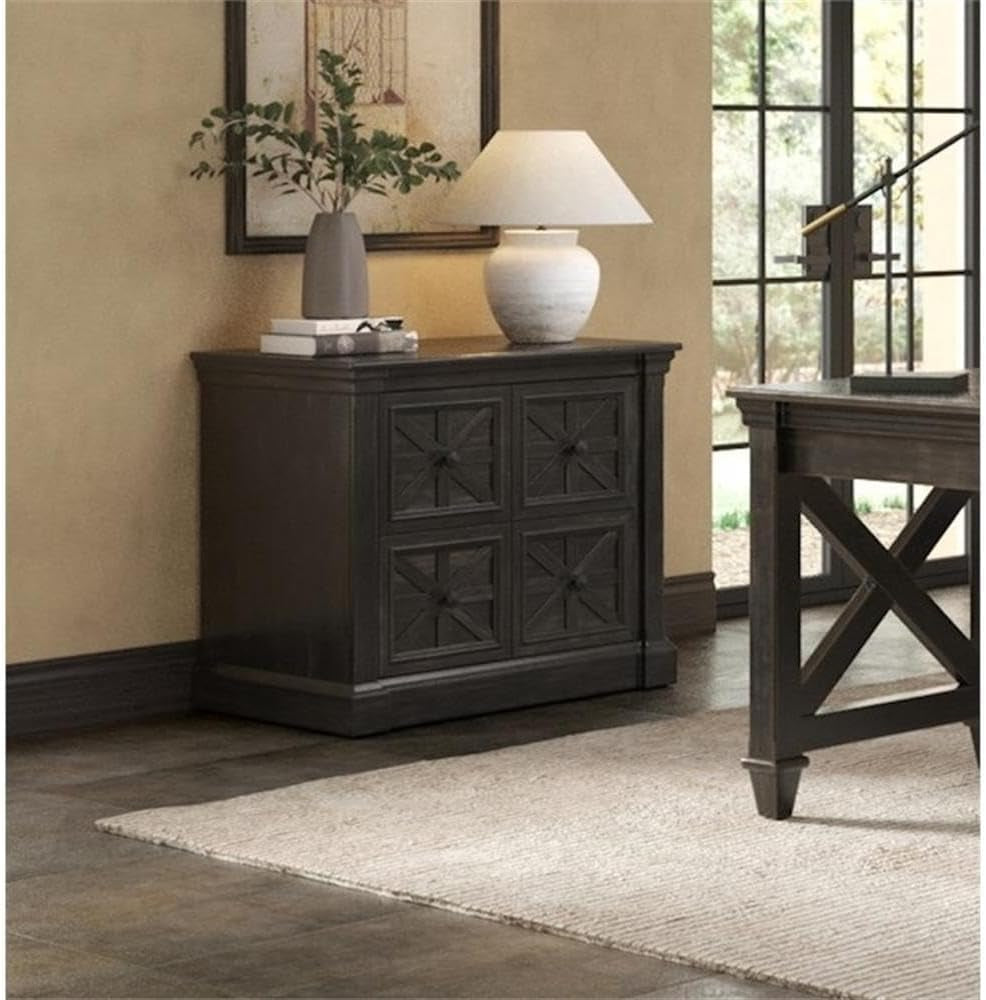Distressed dark brown lateral file cabinet with decorative four-panel drawer fronts shown with a lamp on top