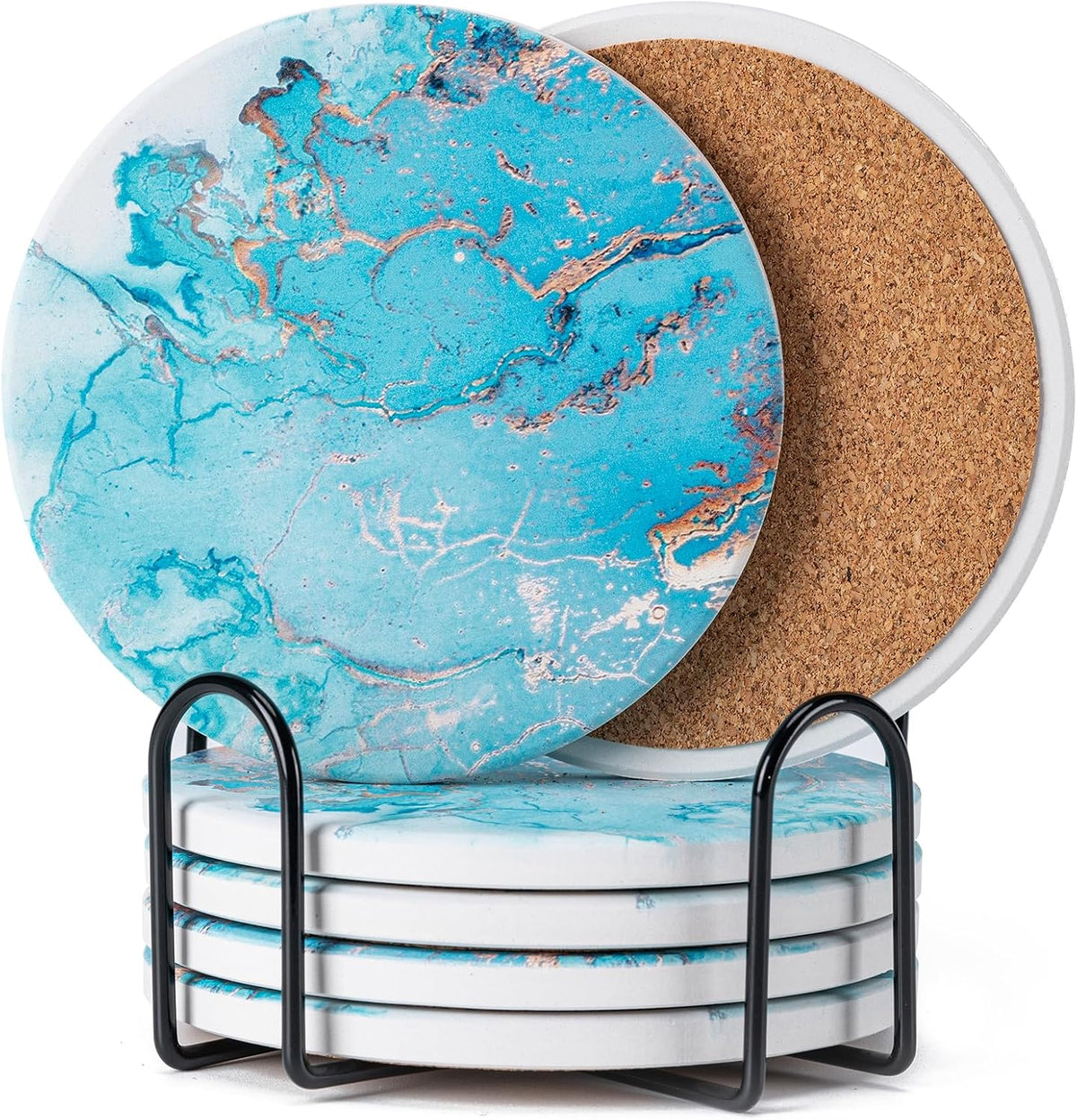 Close detail of stacked round coasters showing white painted edges with blue marbled tops and U‑shaped black holder rails
