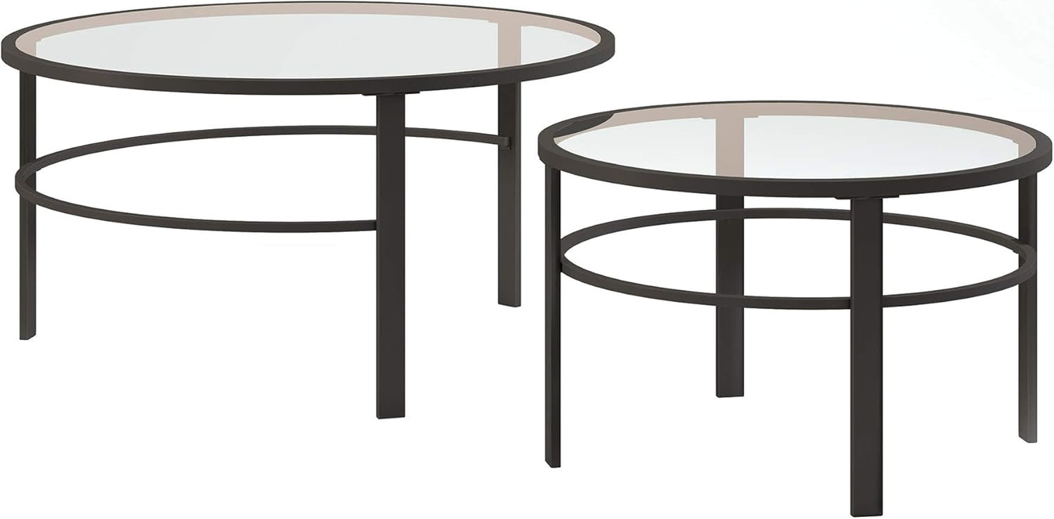 Round glass nesting coffee tables with blackened bronze steel frame on white background, angled front view