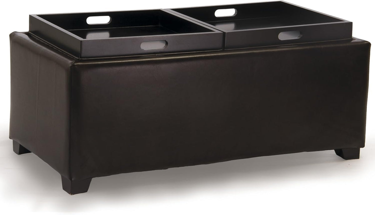 Rectangular brown ottoman shown at an angle with two black serving trays set side-by-side on top.