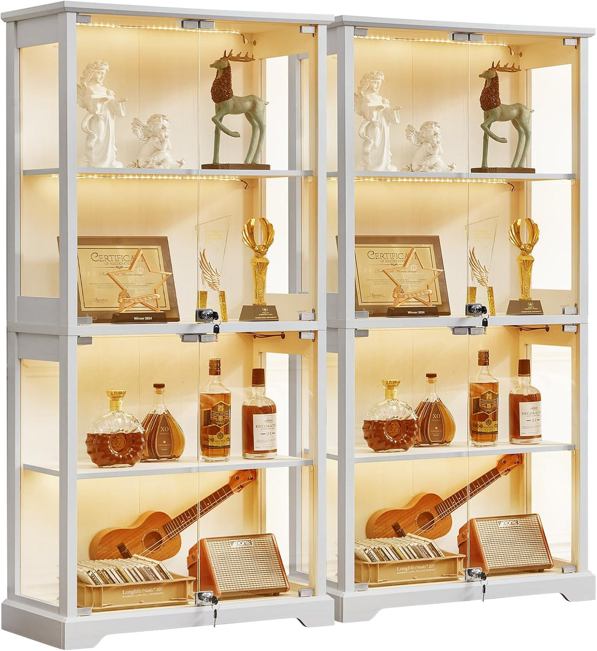 Two identical white display cabinet units shown as a mirrored duo, each with warm interior lighting.