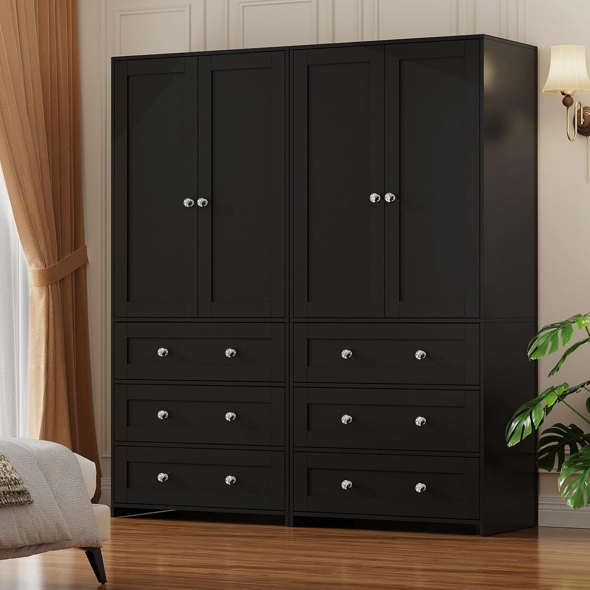 Closed double black wardrobe with four doors and six drawers standing against a paneled wall.