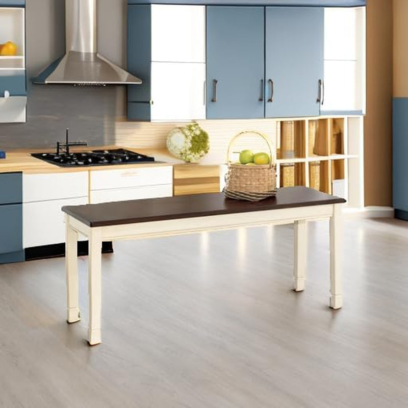 Two-tone cottage bench with brown top placed in a modern kitchen setting with a decorative basket on top
