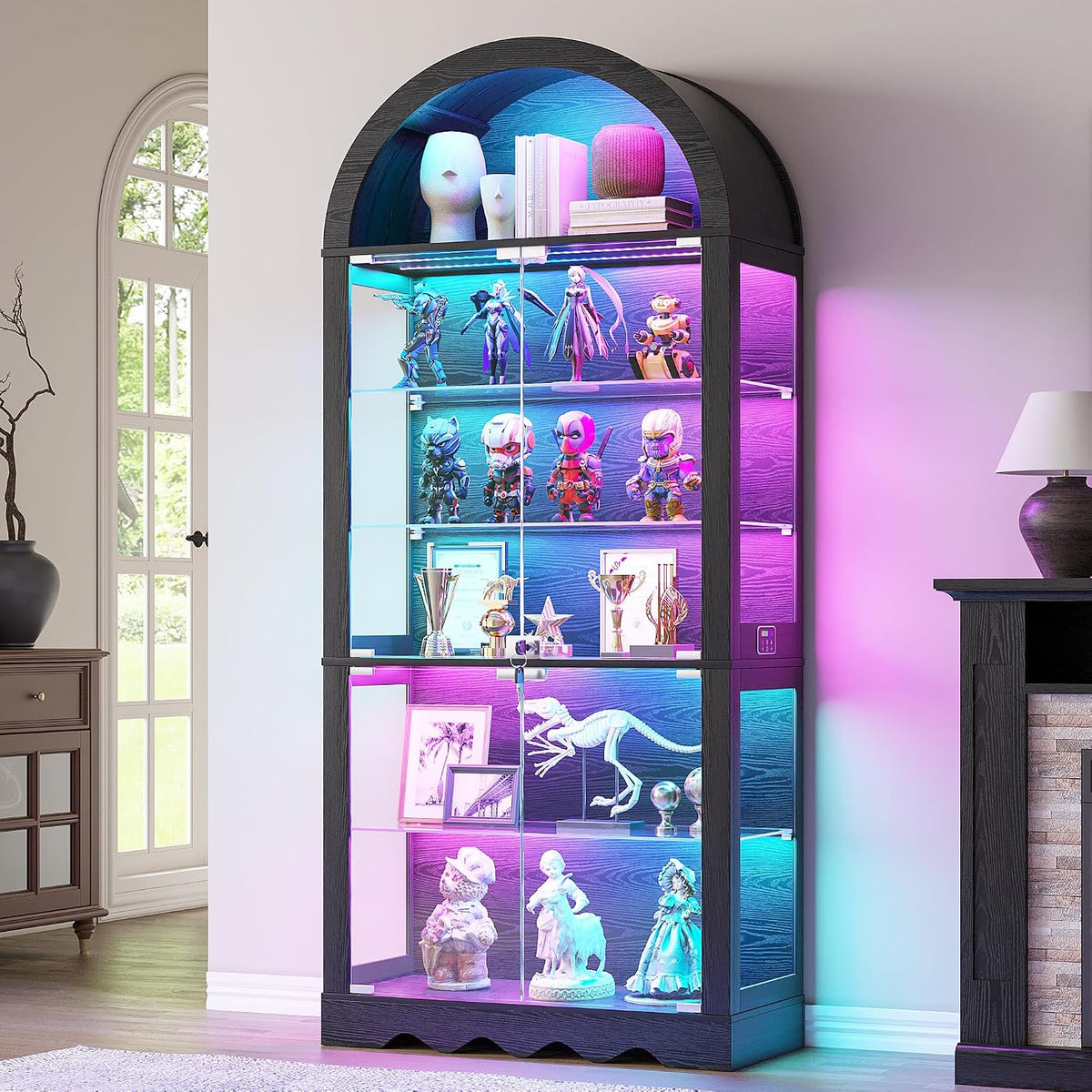 Black arched display cabinet with multicolor RGB lighting bathing glass shelves of collectibles.