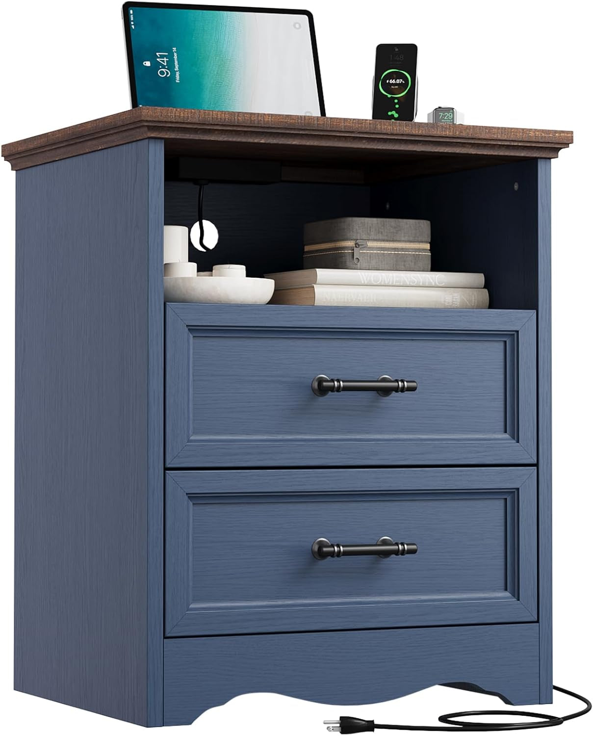 Side-front view of a blue nightstand with open cubby, two drawers and a wood-tone top with charging cord.