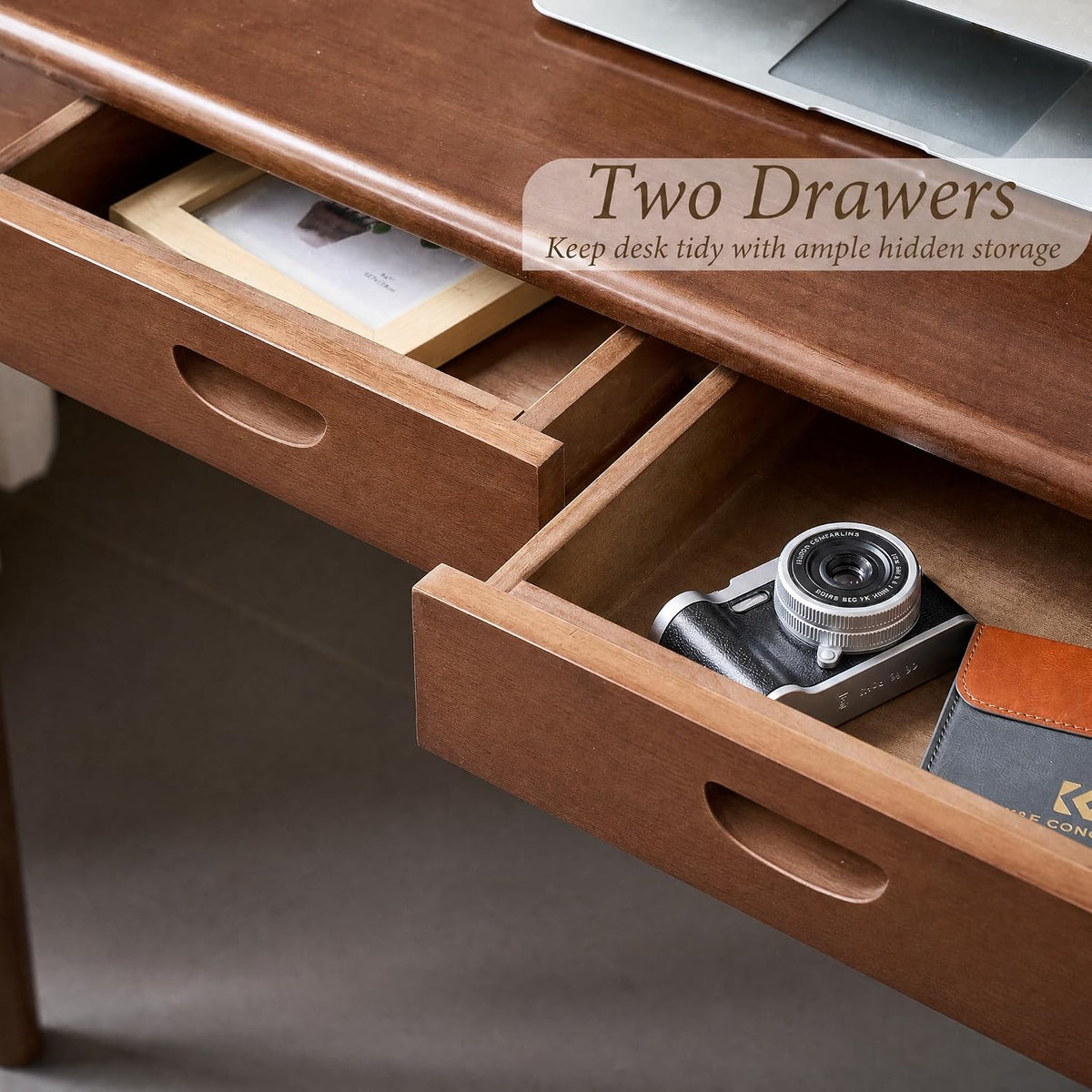 Open drawers close-up with camera and wallet inside, showing interior storage