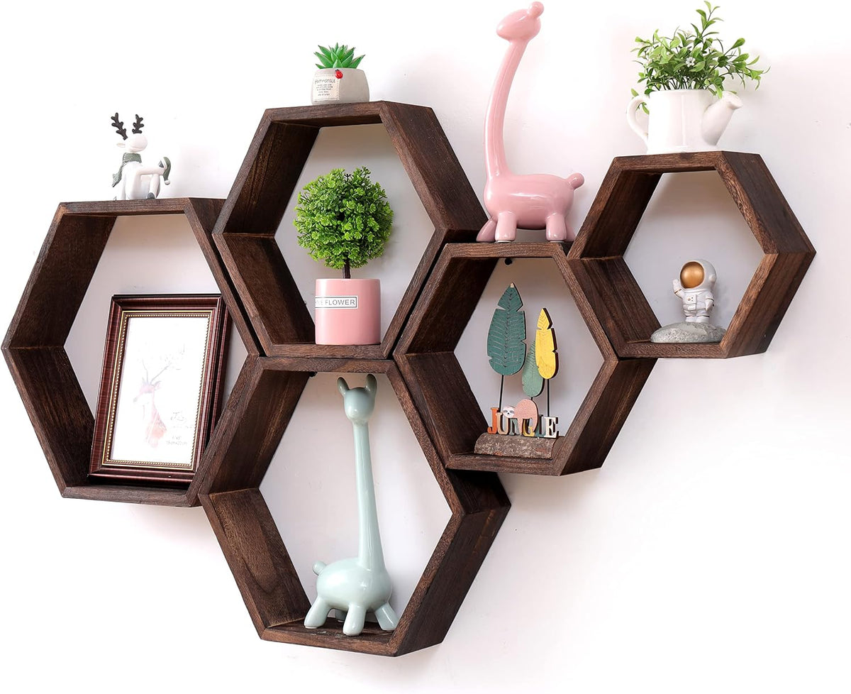 Angled close view of dark brown hexagon shelves holding decorative vases and figurines.