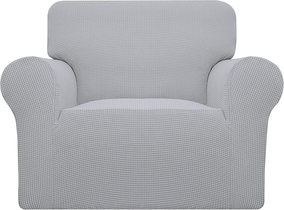 Front-facing single armchair shown in a light gray textured stretch slipcover on white background.