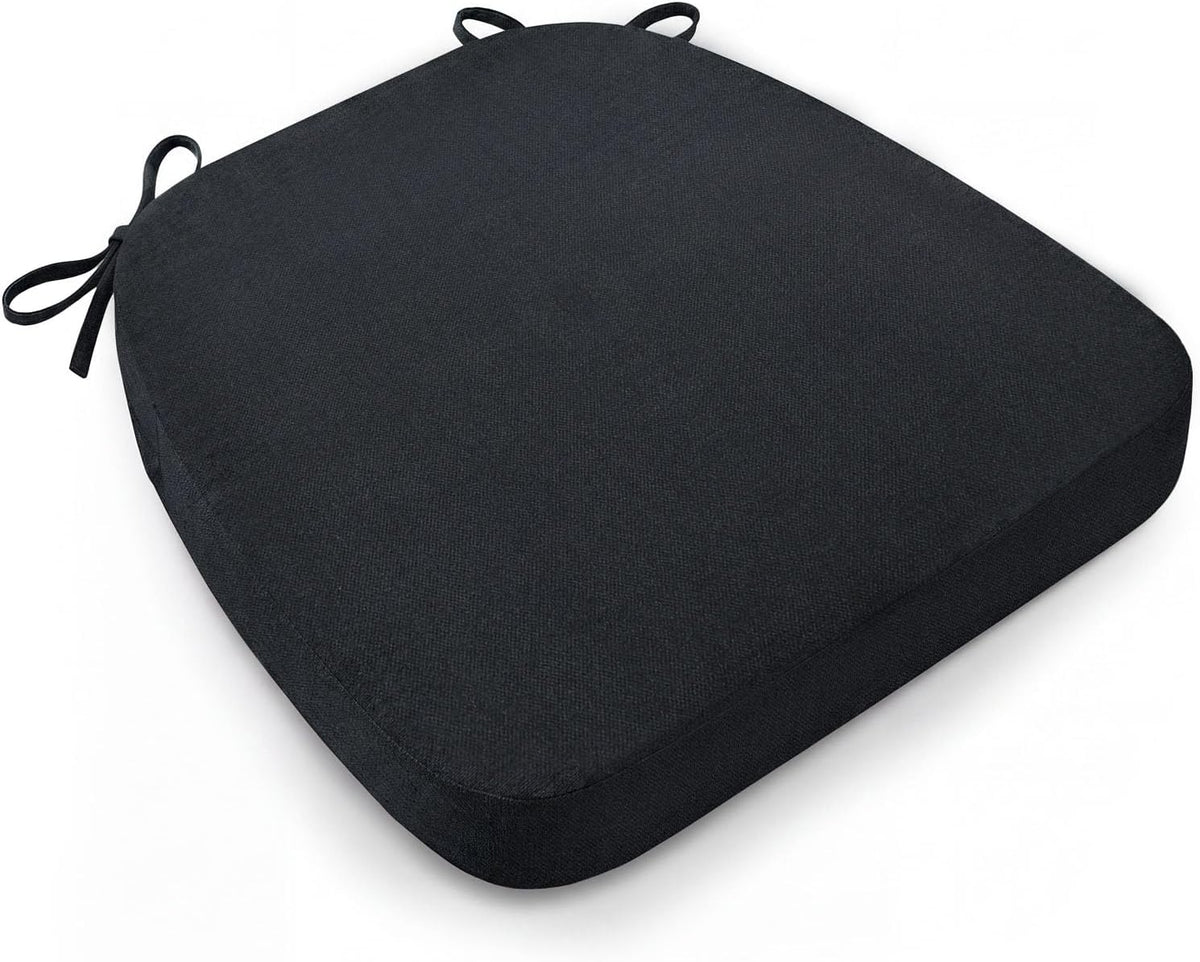Single black D-shaped seat cushion shown angled on a white background with two tie loops visible
