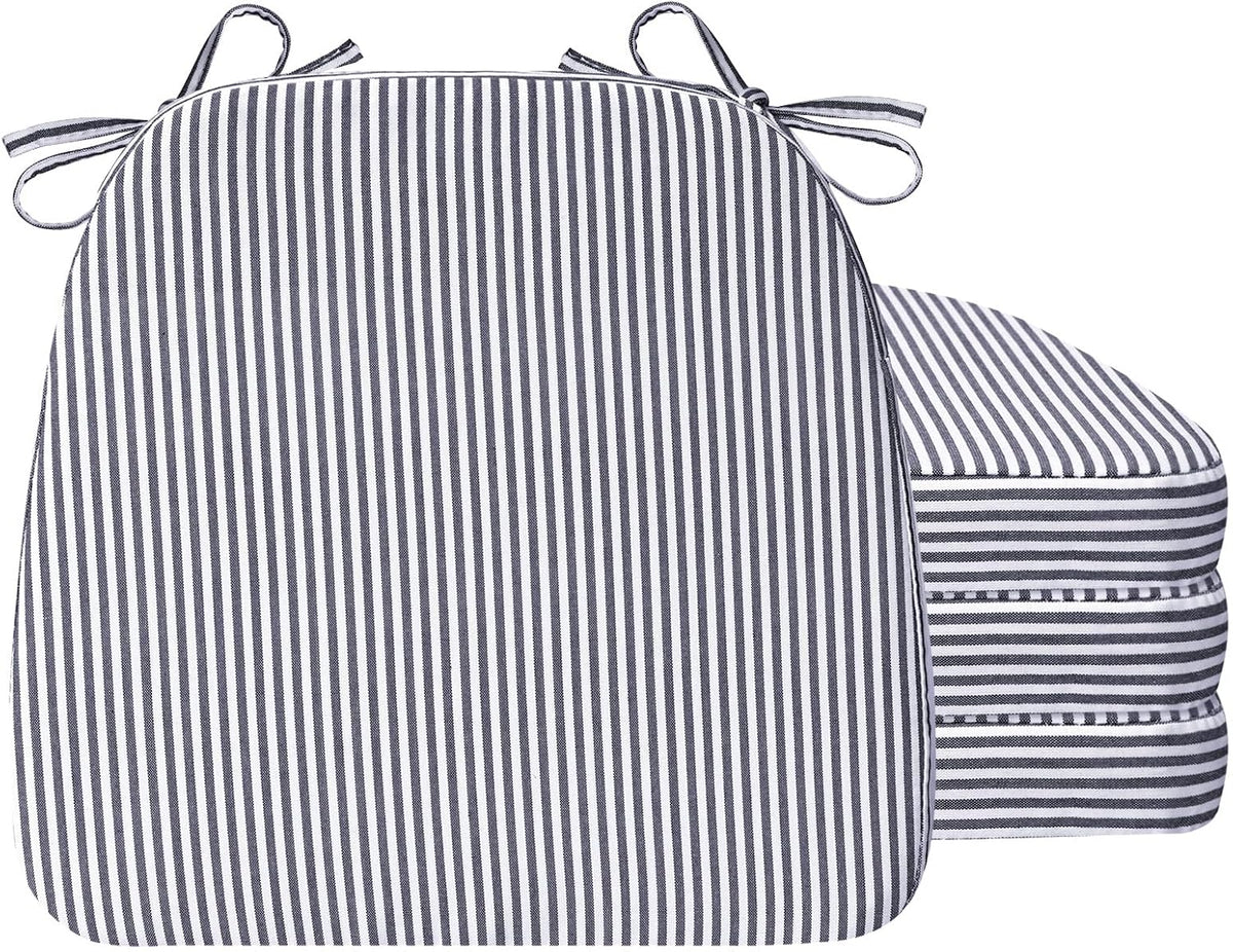 Front-facing navy-and-white narrow-striped cushion with a stack of three matching cushions behind it.