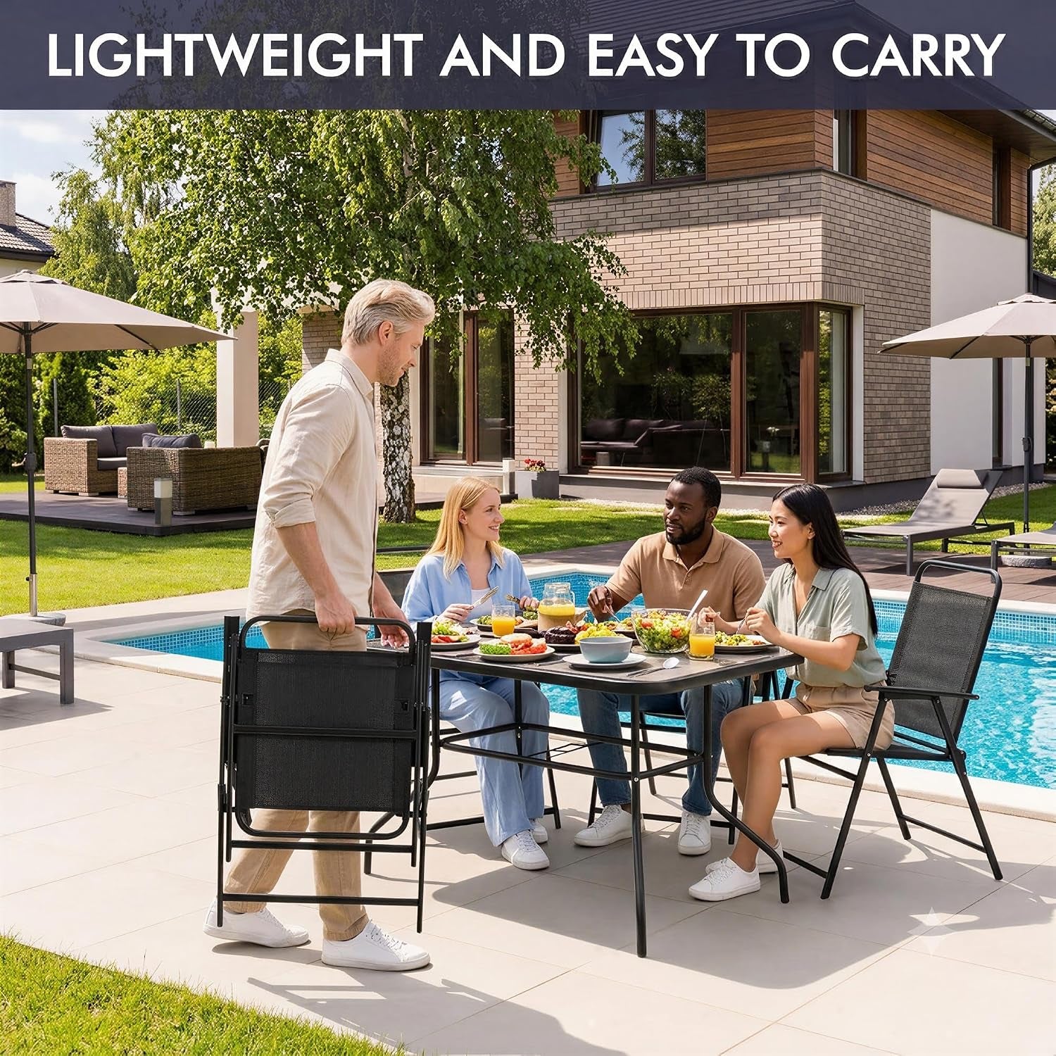 Black folding patio chairs stacked and carried beside outdoor dining set in backyard scene