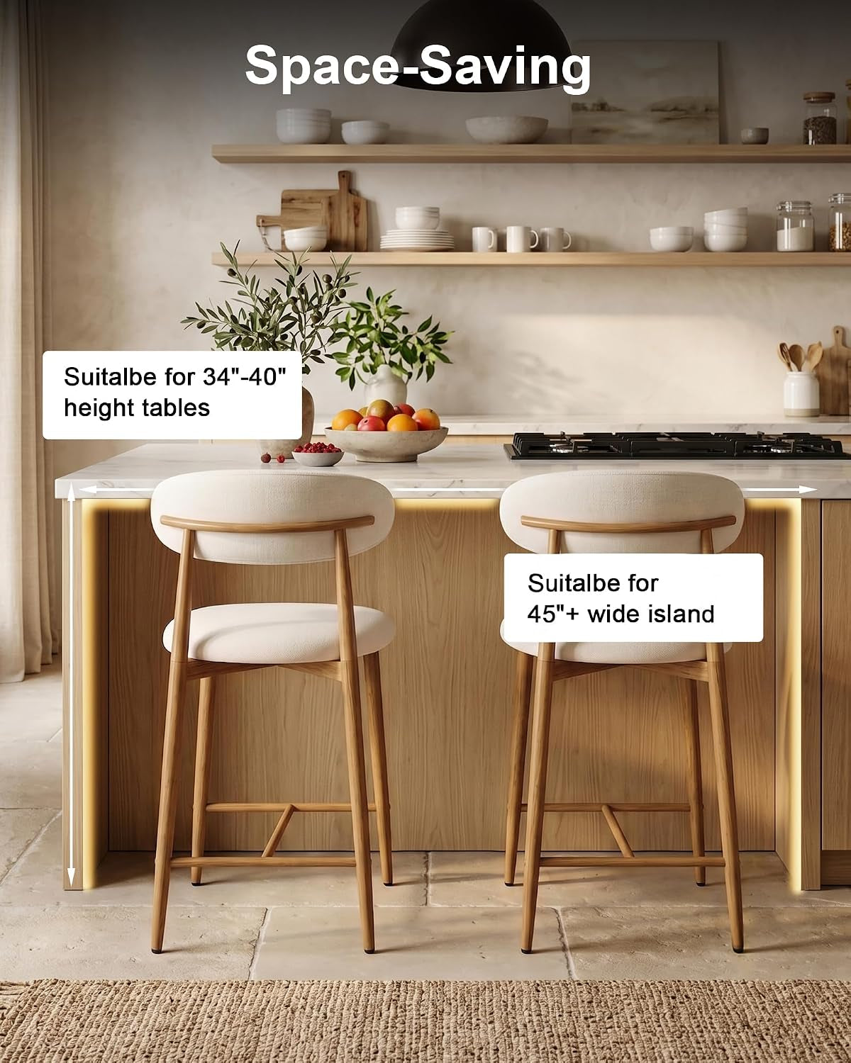 Two beige upholstered counter stools tucked under a kitchen island in a light, airy kitchen setting.