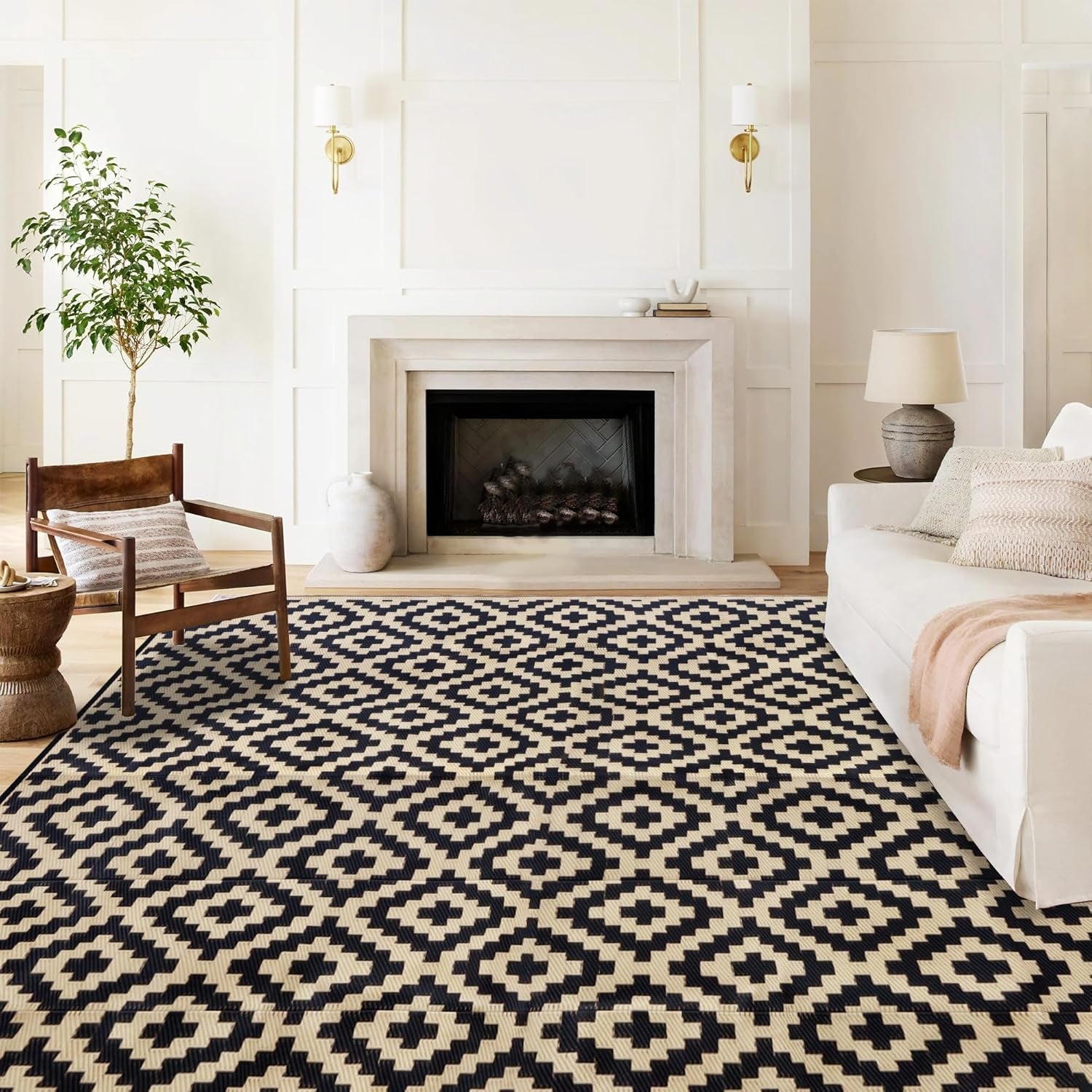 Cream-and-black geometric rug in a bright living room in front of a fireplace