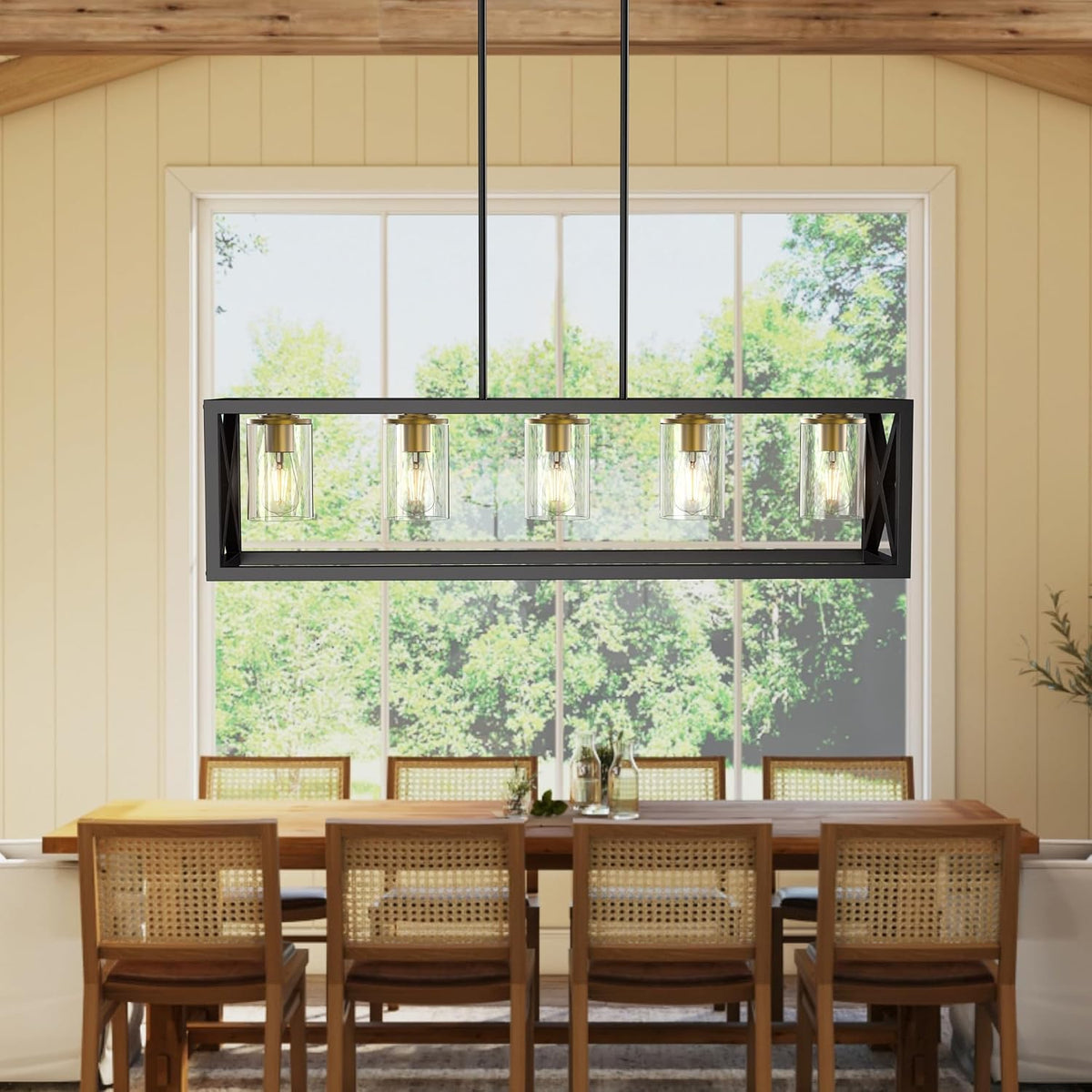 Straight-on view of the rectangular chandelier showing five cylindrical glass shades and cross-braced ends.
