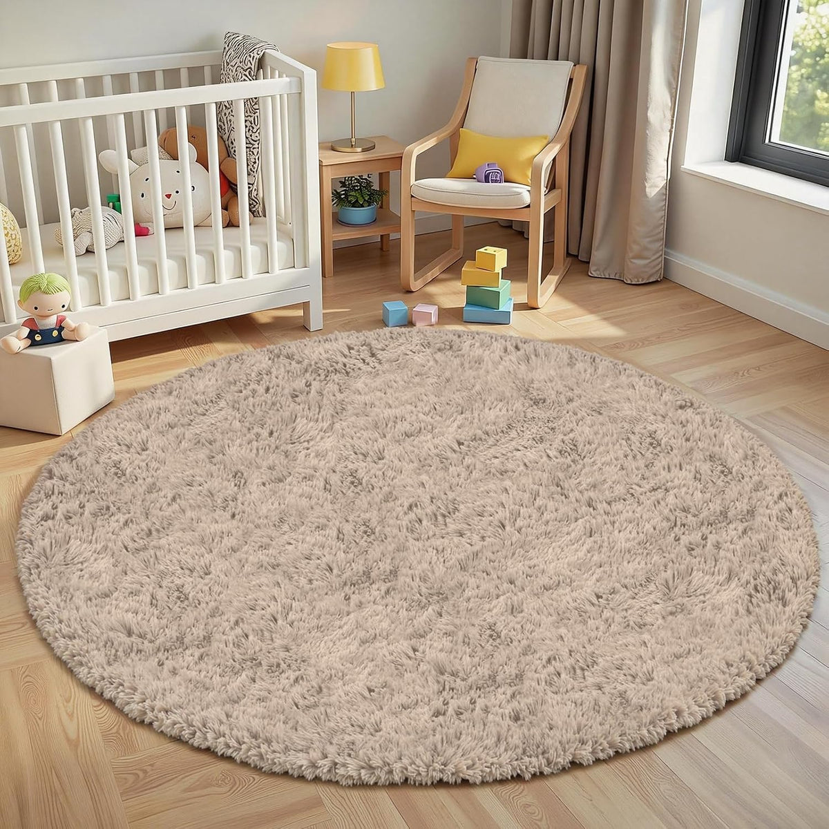 Round light beige shag rug in a nursery with crib, wooden chair and toys
