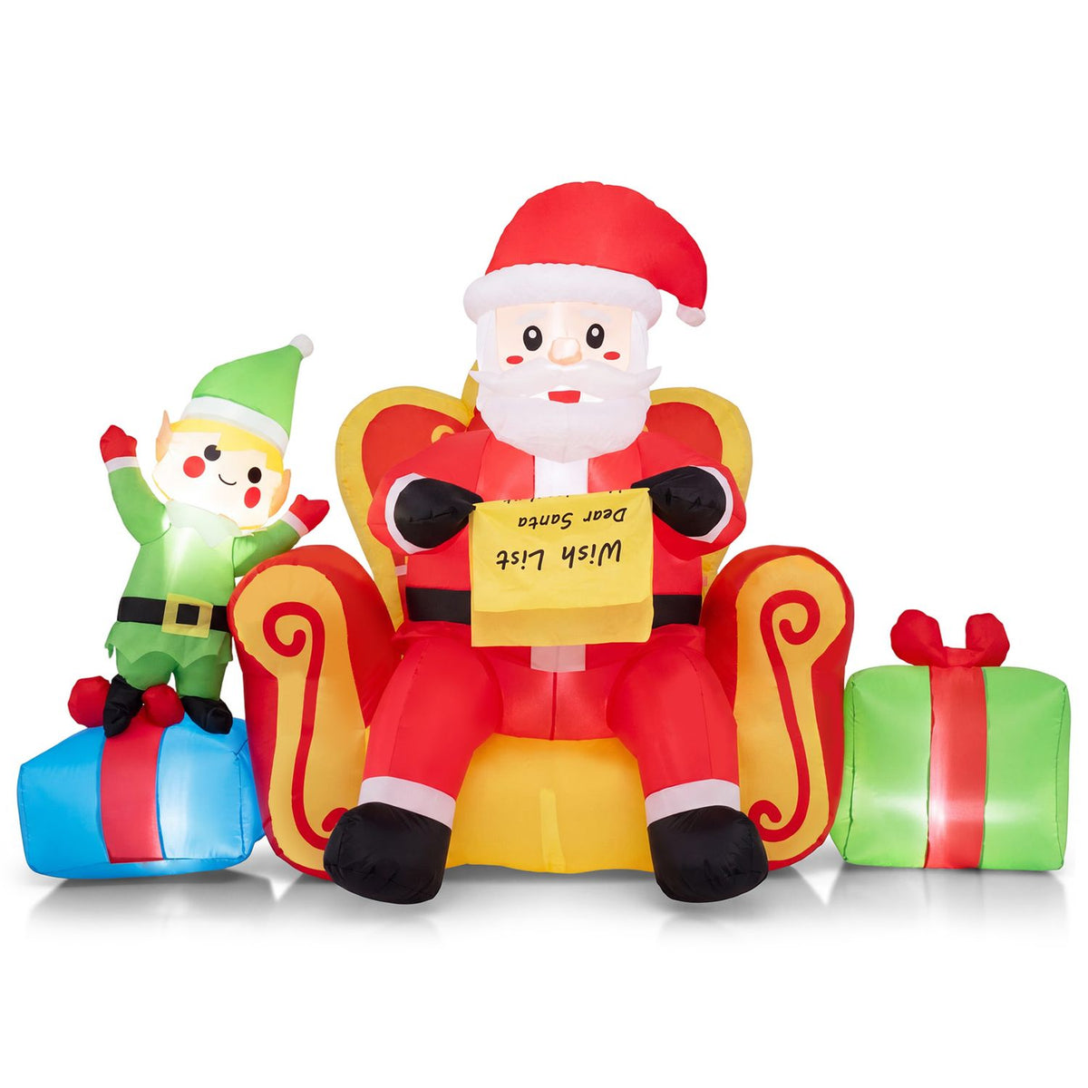 Inflatable Santa sits in an ornate chair between a waving elf and two wrapped gifts on white.
