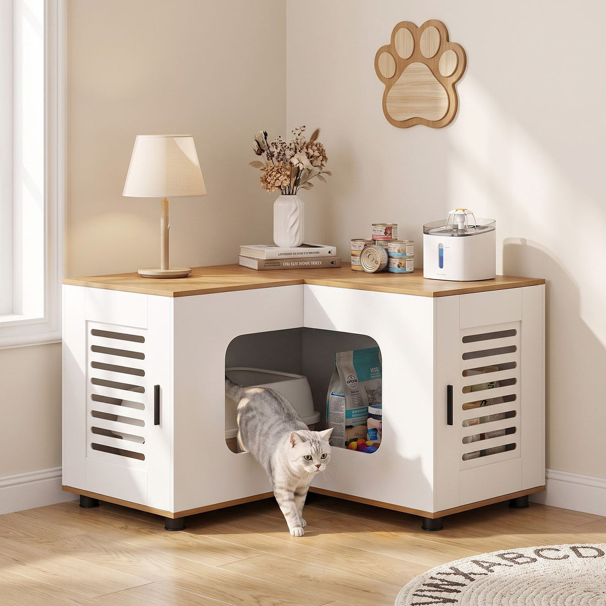 White and natural corner litter box enclosure with a cat exiting in a bright room