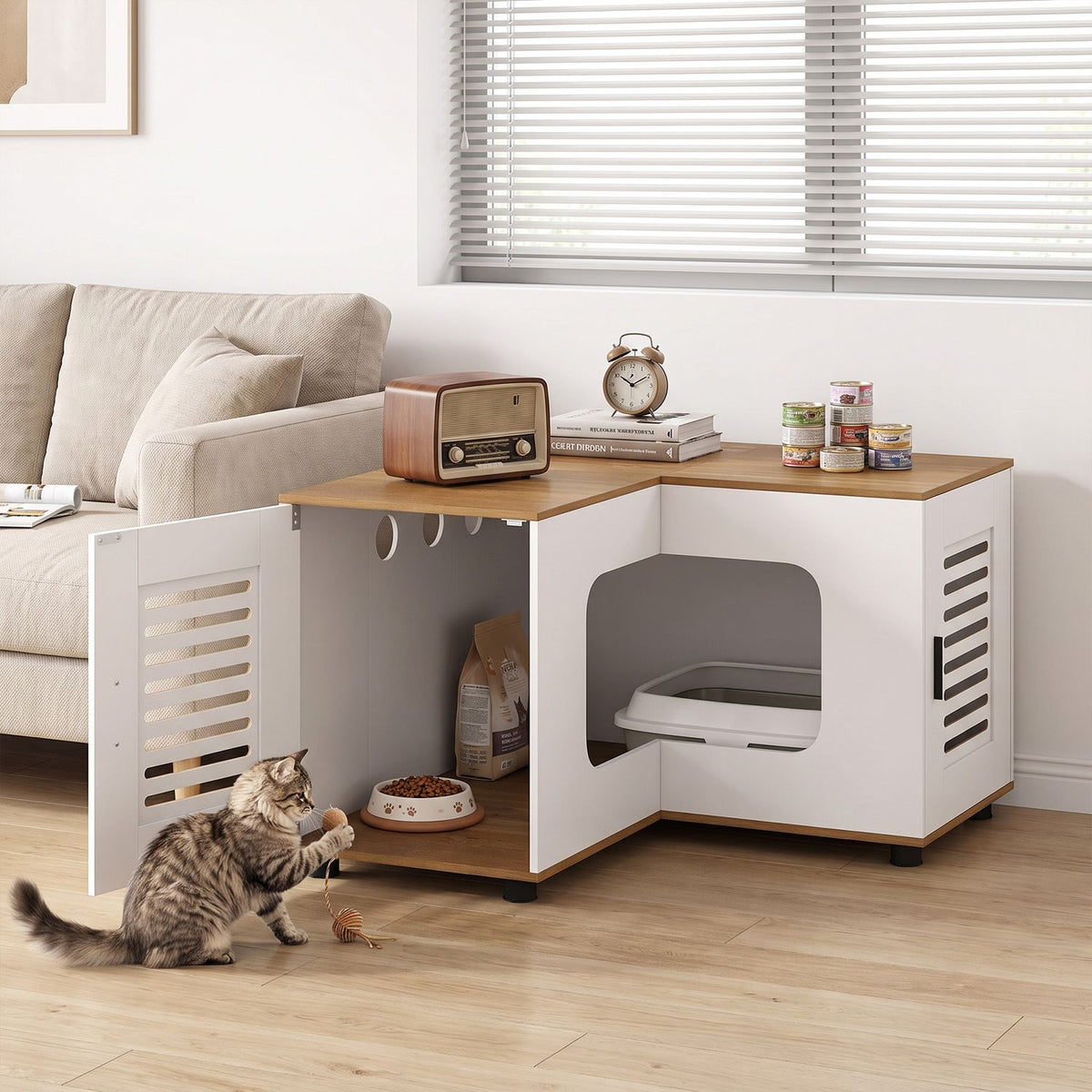 Open corner litter enclosure in a living room with a cat beside it