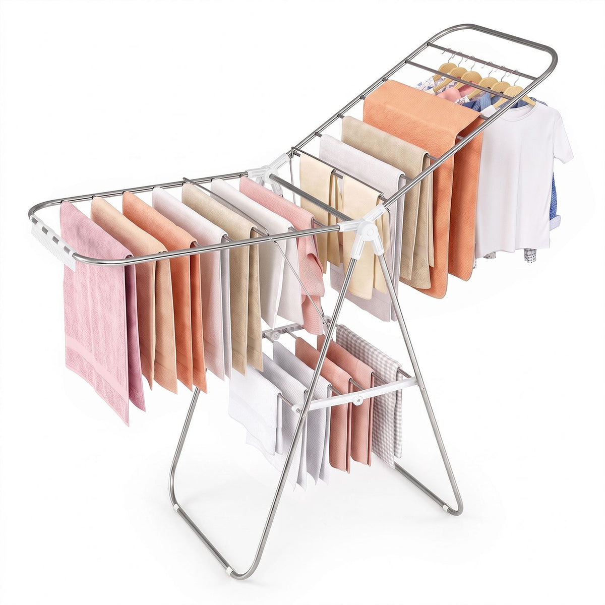Silver folding drying rack with towels hanging from its upper wings and lower shelf