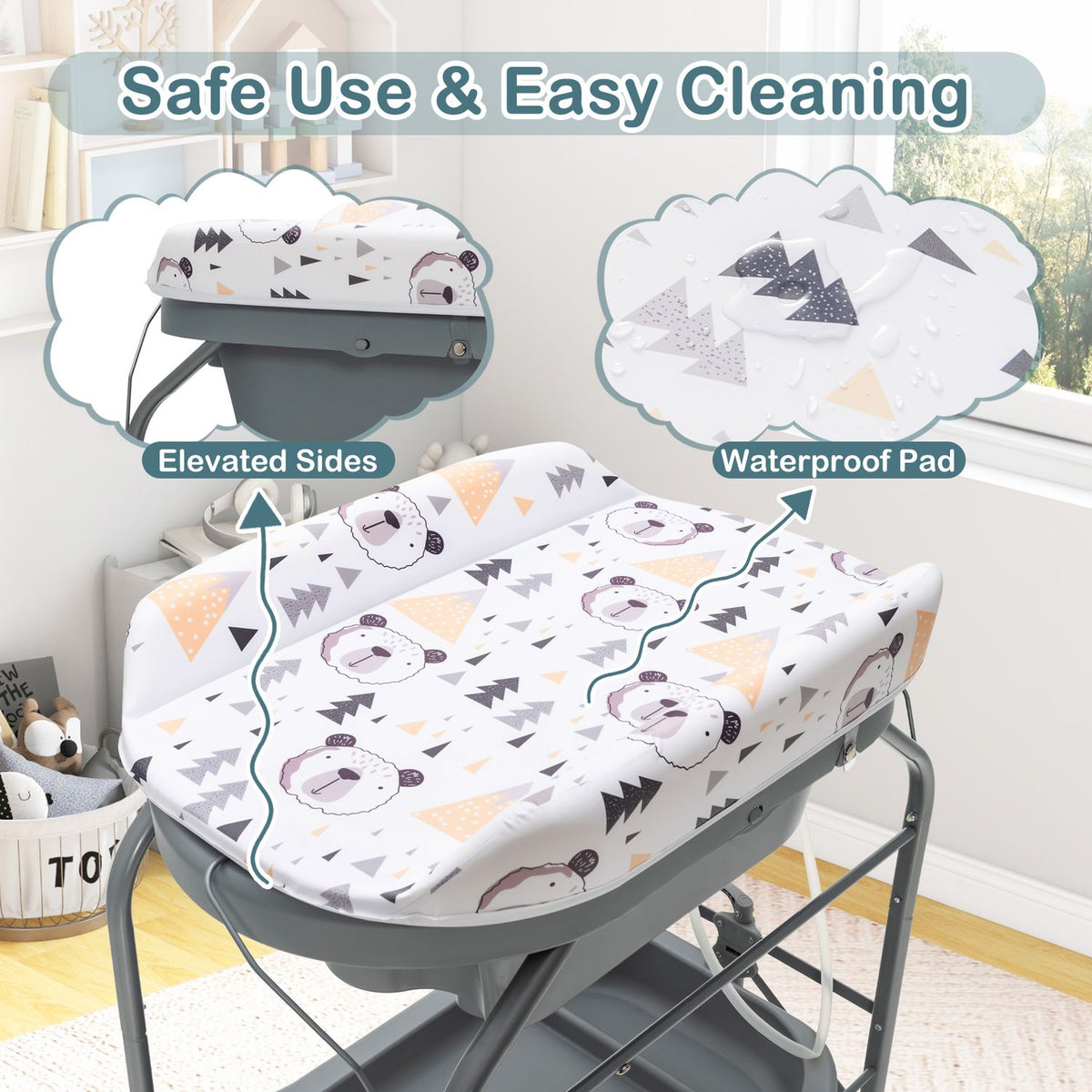 Close view of the patterned changing pad with raised sides on its gray metal frame.