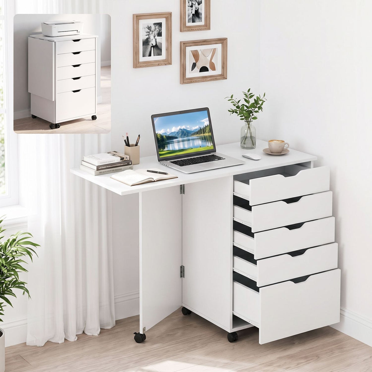 White folding desk open as a workspace, with its drawers pulled out and a closed cabinet inset.