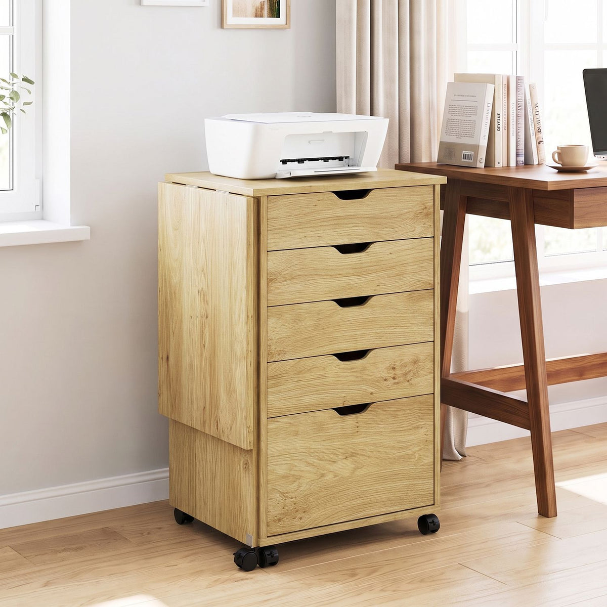Natural-finish folding desk folded into a five-drawer cabinet with printer