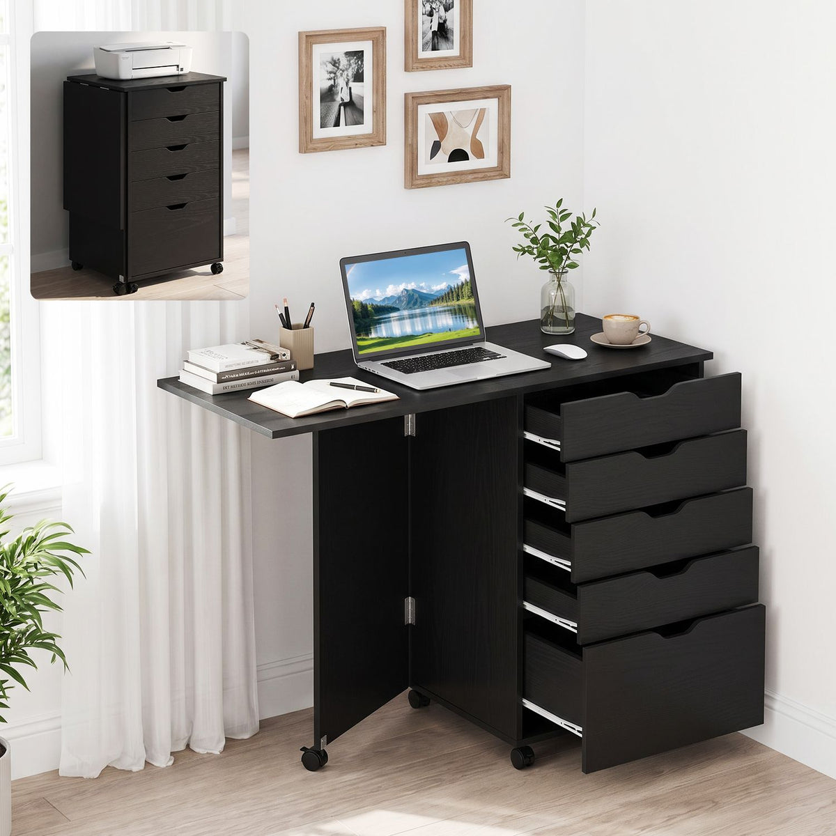 Black folding desk opened beside a window, with a laptop, books, plant and five drawers; inset shows it folded.