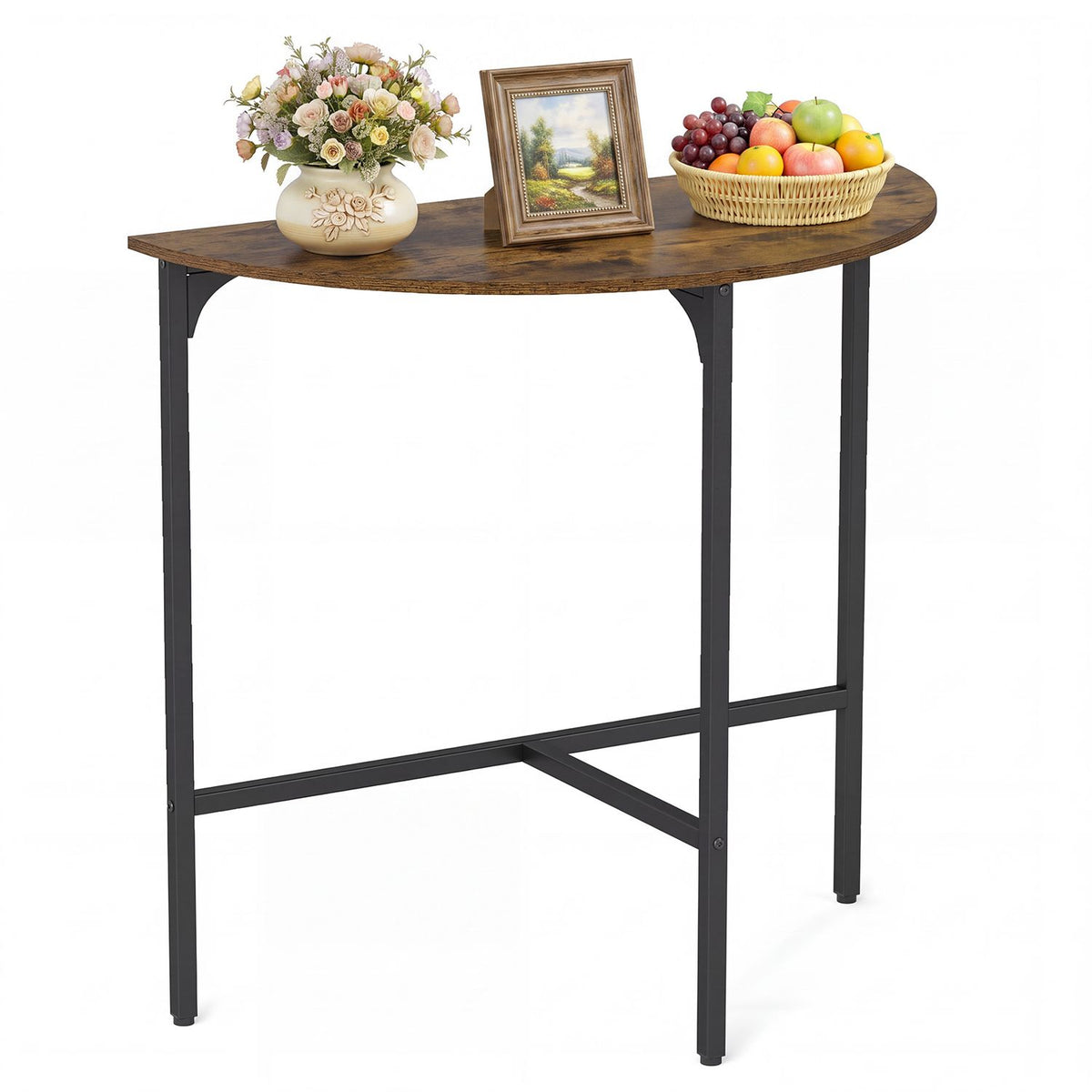 Console table with a curved rustic brown top and black frame, displayed with a flower vase, framed picture, and fruit basket.