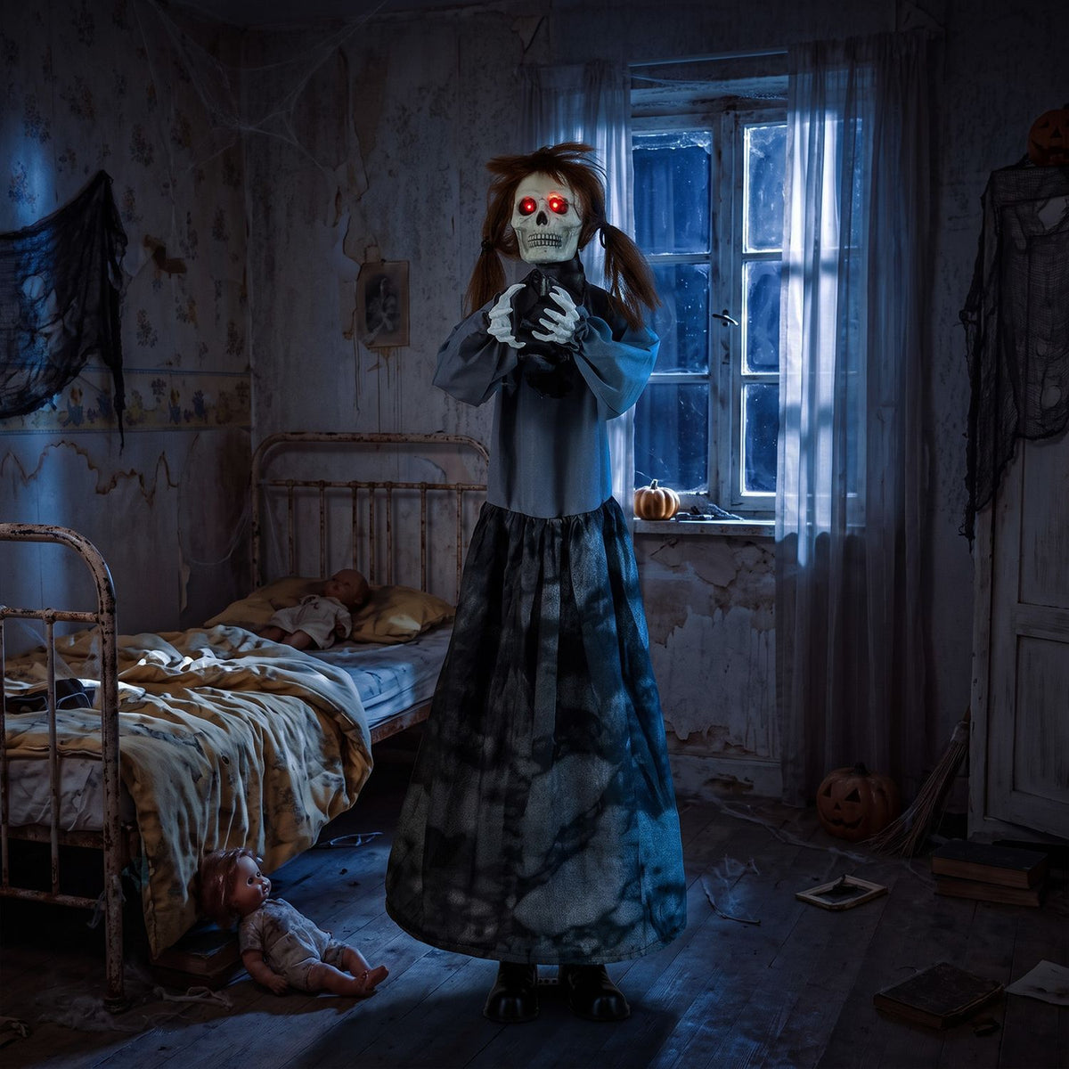 A red-eyed skeleton doll stands in a decayed bedroom with a metal bed, old toys and a blue-lit window.