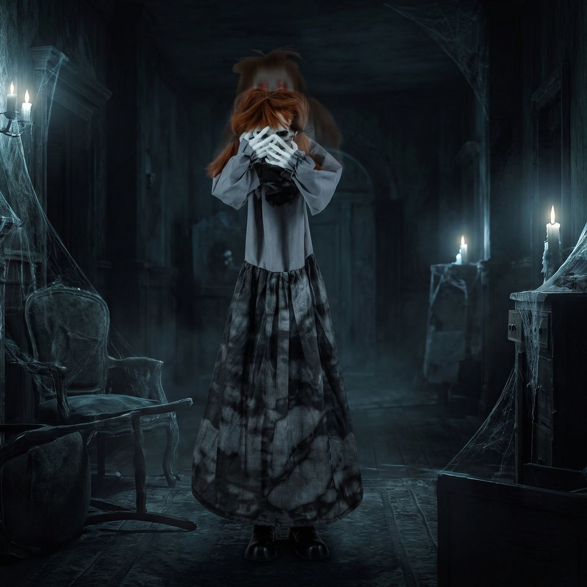A doll with its face partly hidden by crossed hands stands in a dim, cobwebbed room.