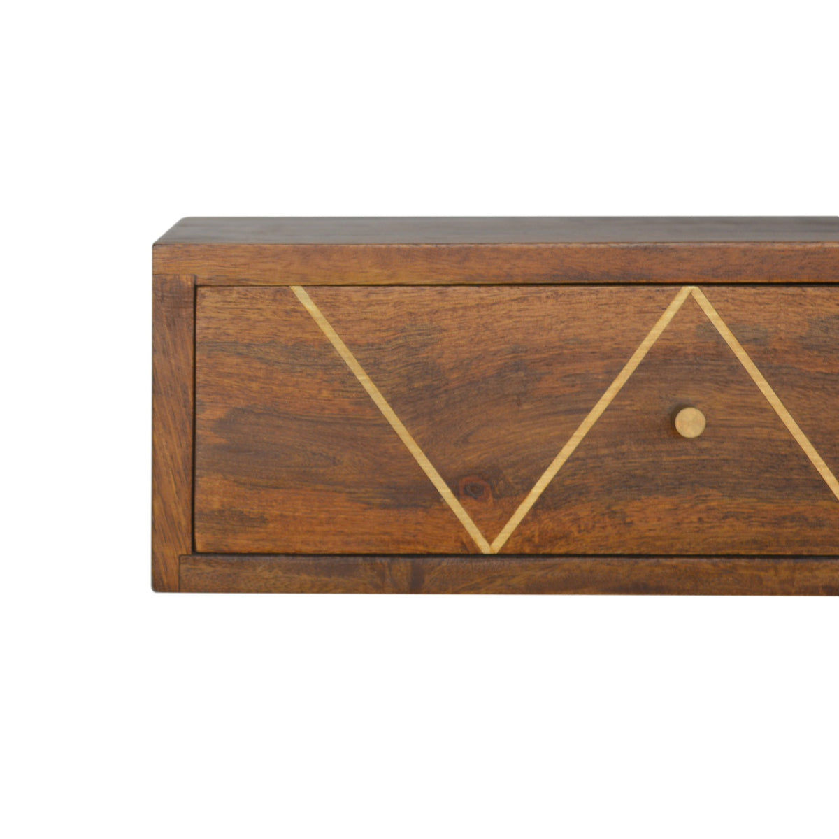 Close front view of chestnut wood grain and brass geometric drawer inlay