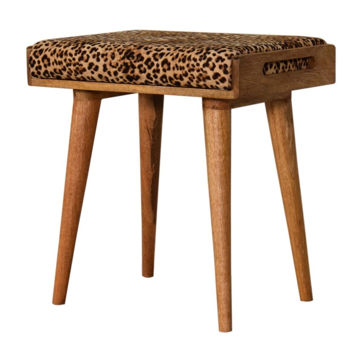 Leopard-print footstool from the opposite three-quarter angle, showing the upholstered top and wood legs