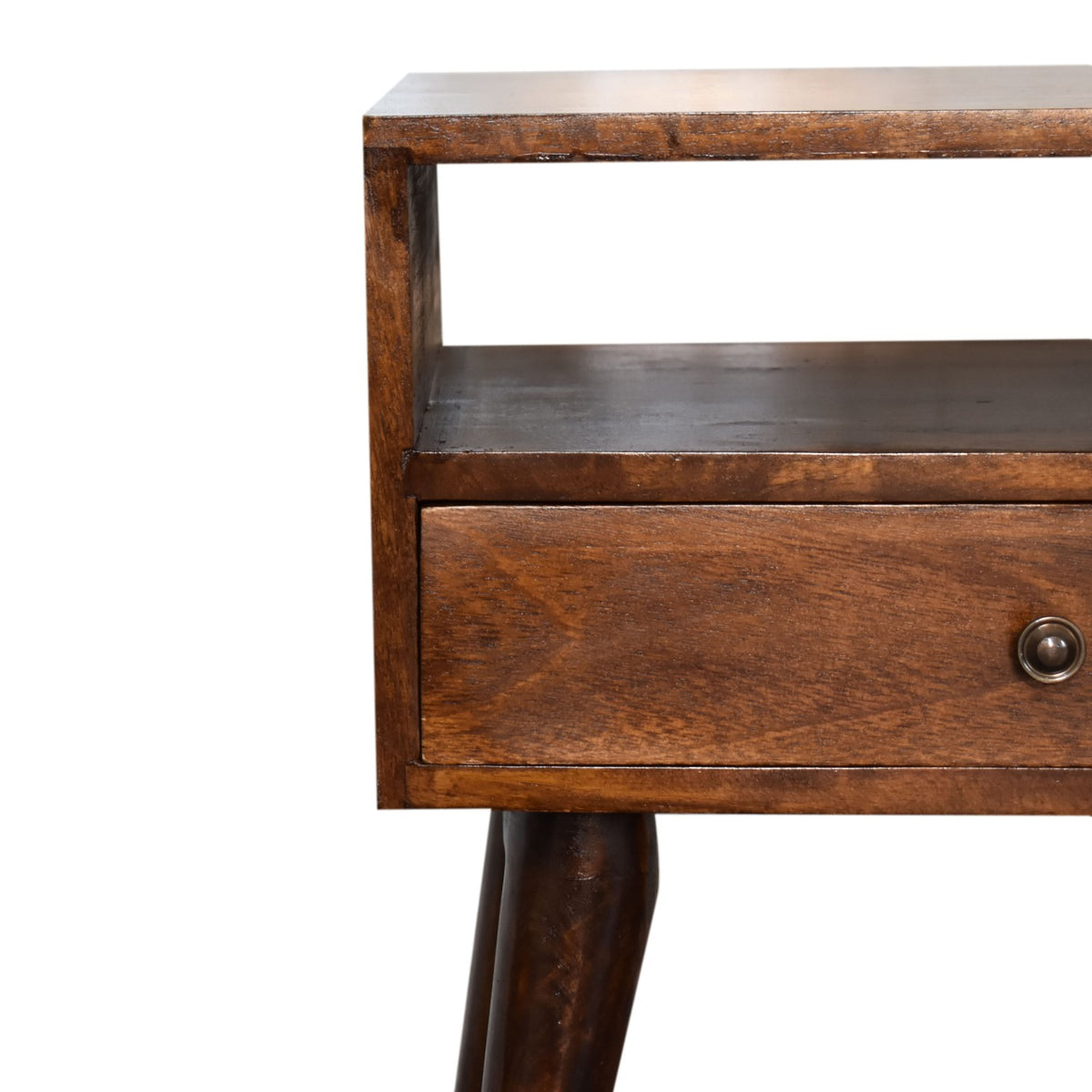 Close view of the nightstand's drawer, brass knob and open shelf