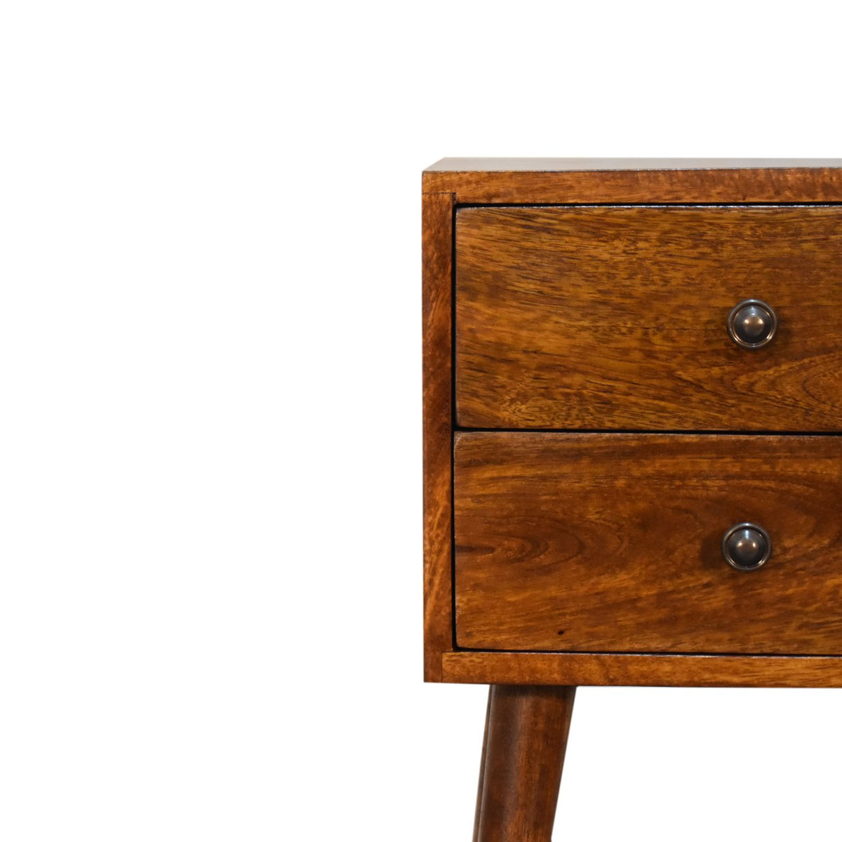 Close view of chestnut drawer fronts, dark knobs, and one tapered leg