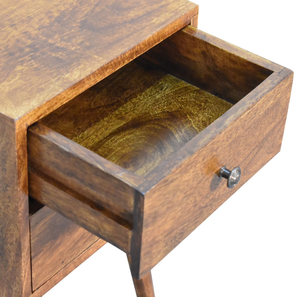 Close-up of an open drawer showing the chestnut wood interior