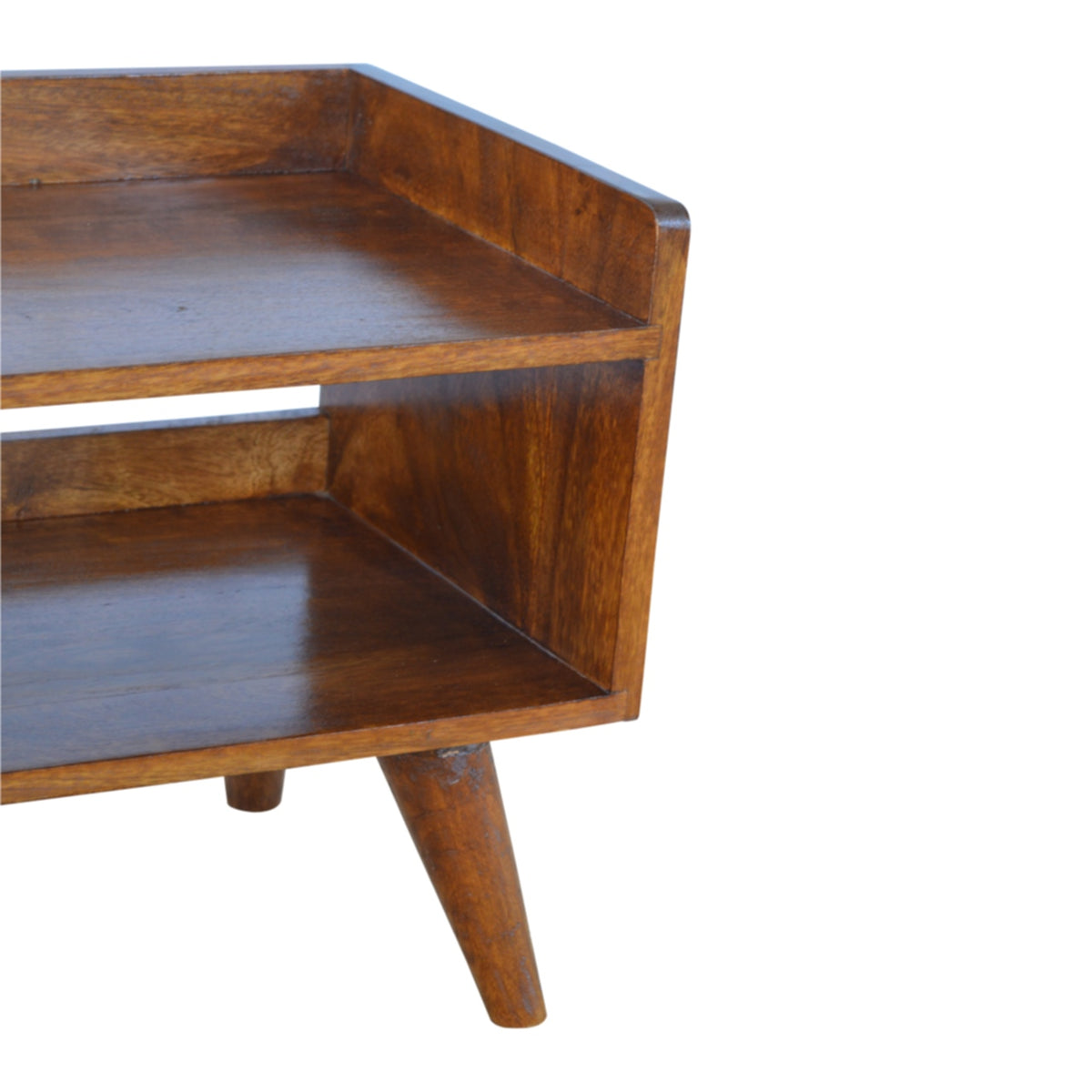 Close-up of the chestnut bench's side panel, open shelves and angled legs