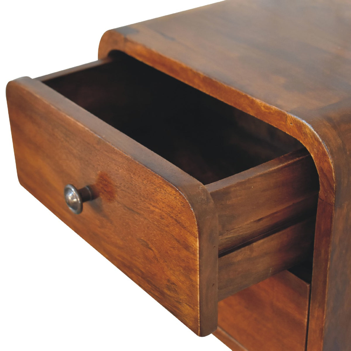 Open chestnut nightstand drawer showing the dark interior and wood sides