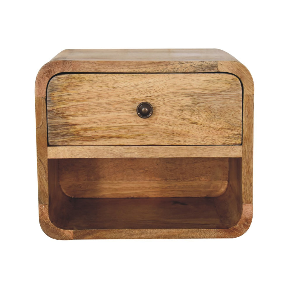 Oak-toned mini nightstand shown straight on with one drawer and open slot