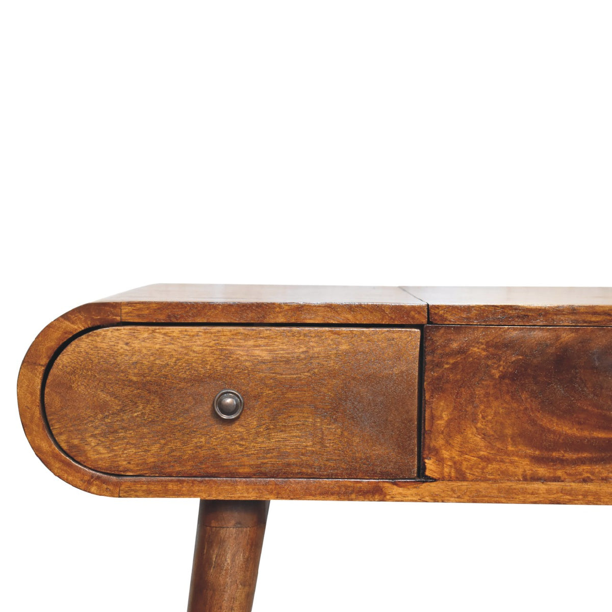 Close-up of a rounded chestnut-finish drawer front and metal knob