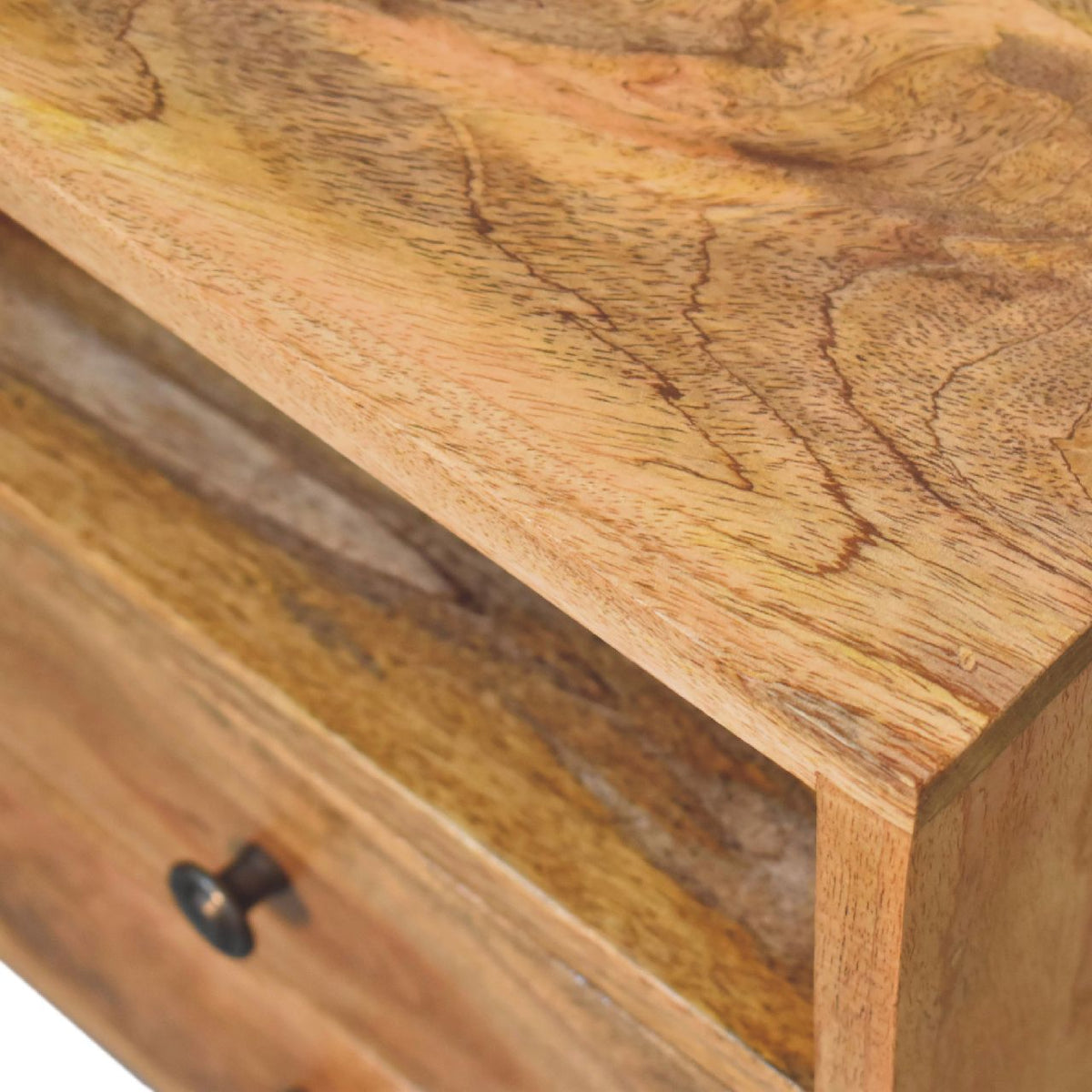 Angled close-up of the nightstand top showing its natural wood grain