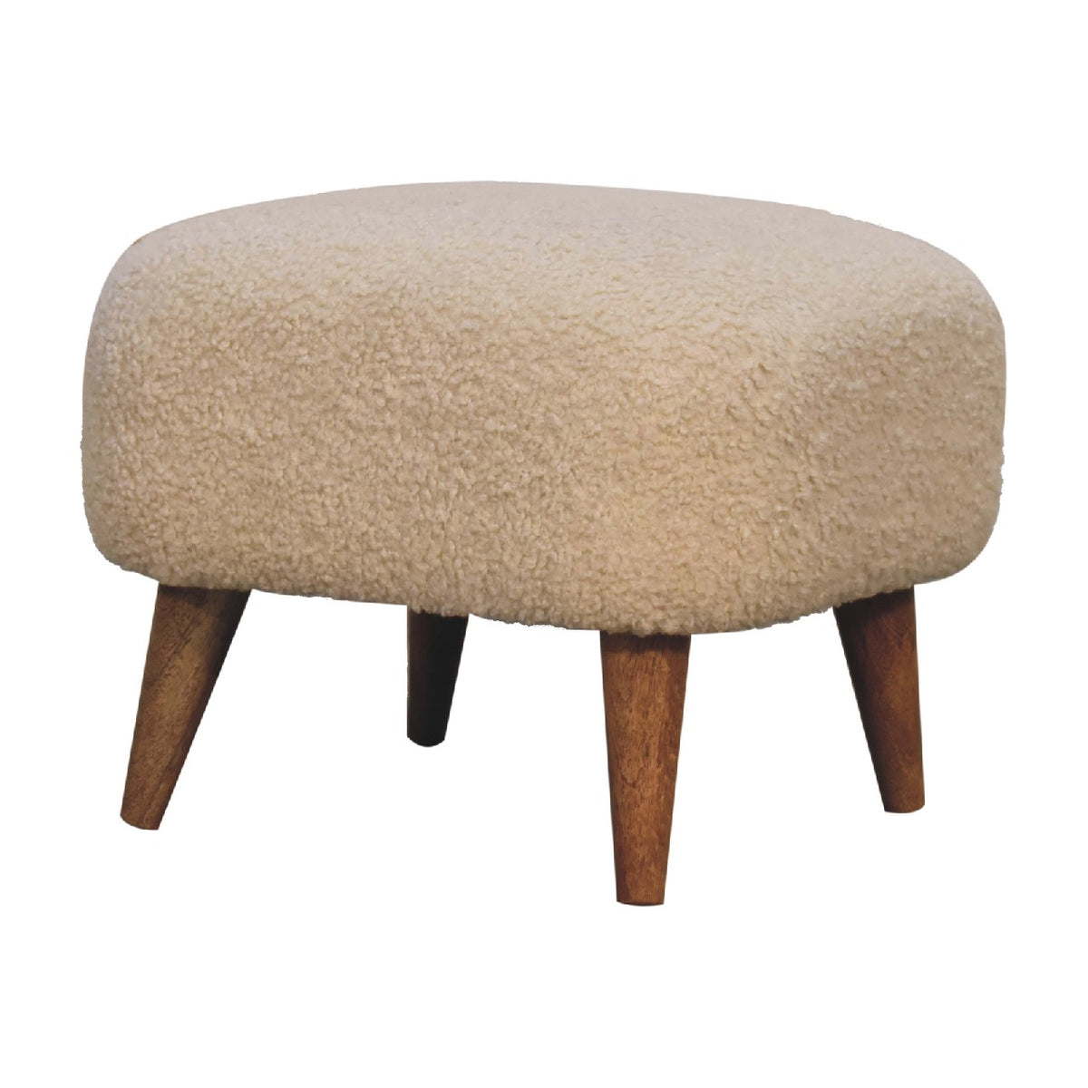 Cream boucle footstool in a three-quarter view, showing its wooden legs